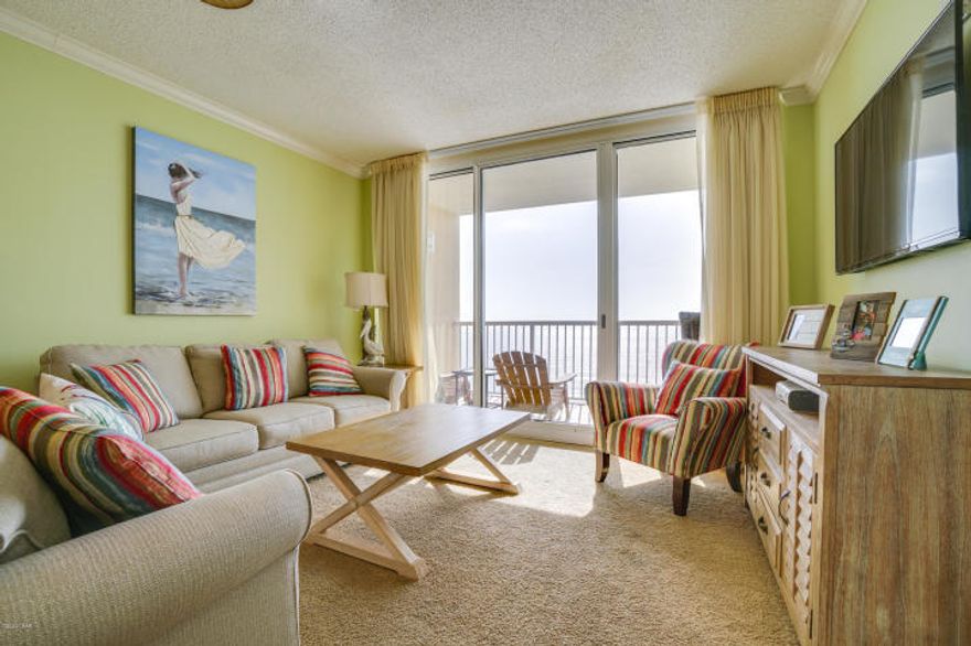 TERRIFIC MID STACK LOCATION! This one of a kind property conjures up images of sun-splashed days of swimming, biking, and relaxing. It lives like a beach house but comes with all the benefits of owning a condo. Will convey with luxurious furnishings, window treatments, and artwork that welcome you to lie back, relax, and enjoy panoramic views of the pool, beach and ocean. Condo has 9' ceilings throughout. Open floorplan allows for fabulous Gulf and sunset views from balcony, living room, dining room, kitchen, & master suite providing the ultimate alfresco living and entertaining environment The fully equipped kitchen features upgrades such as soli granite kitchen countertops, stainless steel appliances, upgraded sink, and custom mirrored backsplash.