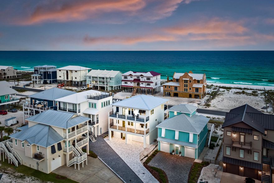 New beach house on Navarre Beach with panoramic views of the Gulf and the Santa Rosa Sound.  This newly constructed home is just 5 houses away from the Gulf Island National Seashore where you will find 7 miles of pristine beaches to walk. On the bottom floor is a two car garage with a recreational area for table games, plus an air conditioned foyer with an elevator which will carry you to the 2nd and 3rd floors. You will find two Gulf front facing bedrooms, with spacious balconies to watch the waves roll in. Both masters have ensuite baths with beautiful tiled showers.  There are 4 bedrooms, each with a king bed.  In the hallway, near the bedrooms are 4 luxury bunks, large enough for full size mattresses to accommodate adults.   House sleeps 16 people.  click ''more''.