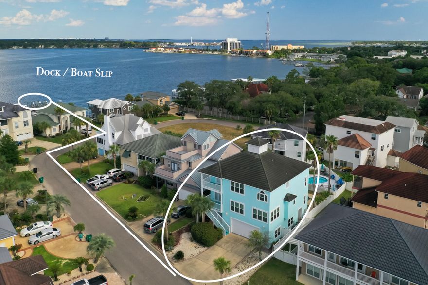 STUNNING HOME WITH BOAT SLIP!! Nestled in the desirable Palm Harbor community, this 3-story home offers expansive views of the bayou, spacious living, and ideal amenities for both everyday living and entertaining! The second floor welcomes you with two expansive living areas, a bright and open kitchen, dining area, half bathroom, and laundry room. Large windows flood the space with natural light creating an inviting atmosphere. All four bedrooms are located on the top floor, including the luxurious primary suite featuring bayou views, a tray ceiling with ambient lighting, private balcony, and a spa-style bathroom. The master bathroom includes a soaking tub, walk-in shower, double vanity, makeup station, and a generous walk-in closet. Two additional bedrooms upstairs share a jack & jill bathroom and one includes it's own balcony. The ground level features two over-sized bonus rooms, one with a full bathroom. Enjoy Florida living with a screened-in Florida room, private pool, hot tub, and outdoor shower. A massive garage provides ample space for cars, tools, or water toys. This thoughtfully designed home provides comfort, space, and stunning views. Don't miss the opportunity to own a beautiful property with a private boat slip with a 16,000 pound lift!