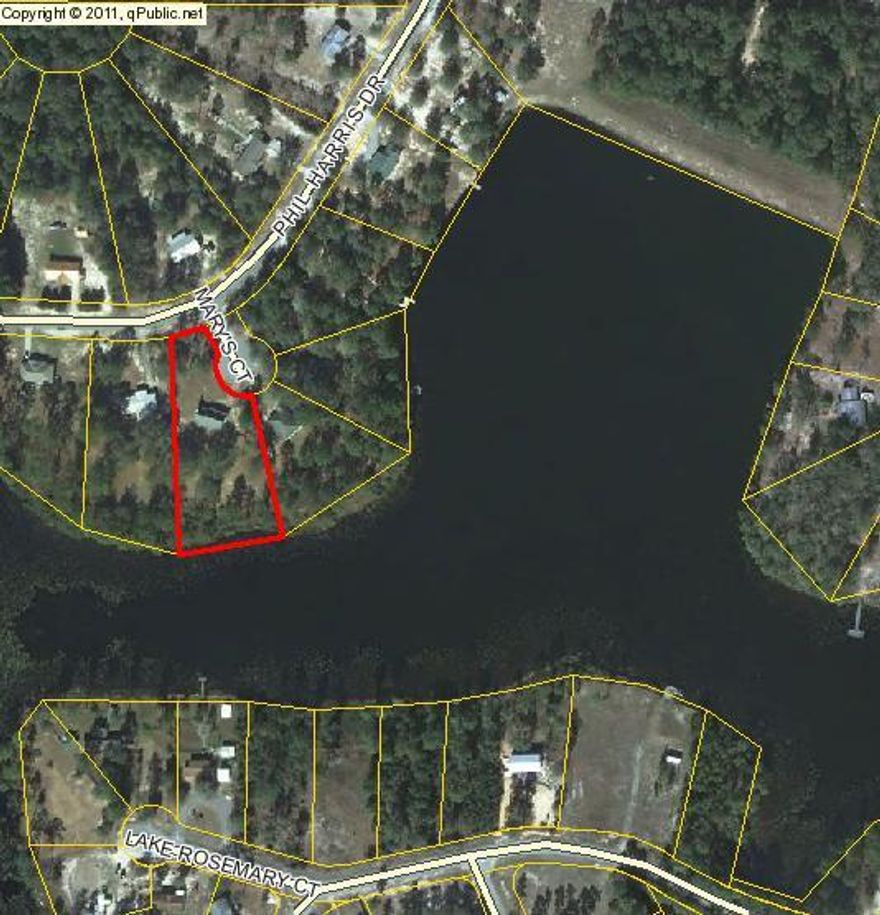 Move in Ready freshly remodeled Lake front home on 1 acre!!! Great neighborhood with underground utilities close to town and schools. Home has a large approximately 1 acre corner lot with over 170ft on the lake with and an amazing view. The back yard has huge oak trees that shade the picturesque view of the lake. Home features nice front porch, back patio. Fireplace in the living room, Ceramic tile in the kitchen and baths, New Hardwood floors in the Living room and hall, New carpet in the bedrooms, Fresh paint for the whole inside. 17 ft ceilings with open lighting in the kitchen and master bedroom. Exterior of home is maintenance free brick and vinyl. All this, and only 45 minutes to the beaches of South Walton.