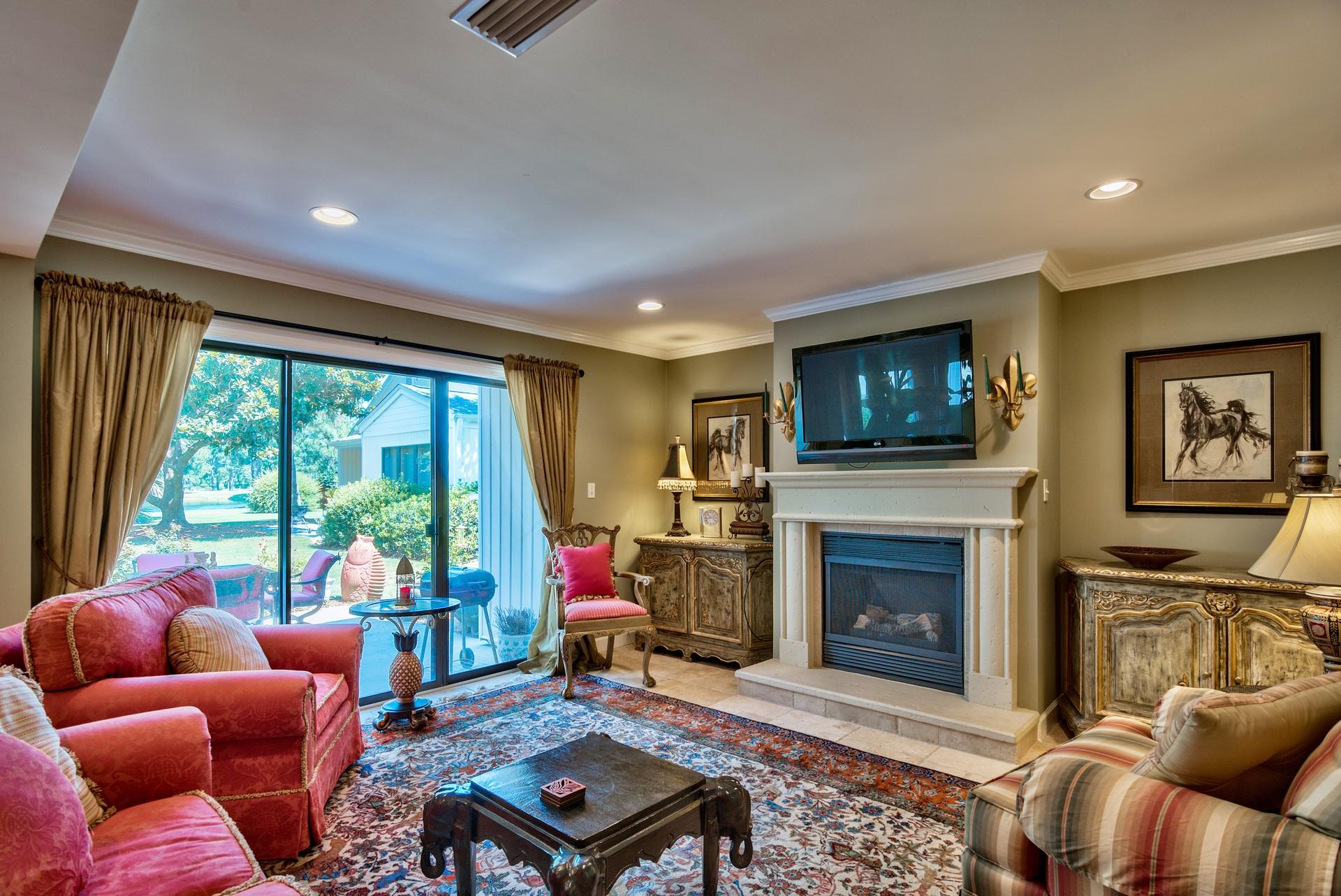 This is a totally updated and rare detached condo with beautiful lakefront views. The owner has paid attention to all the details by adding a decorative fireplace to the living area, enclosing the original screened porch for additional family room space, remodeling the kitchen so that it's open with tons of cabinet space, remodeling the bathrooms to be modern and new, and even finding extra space to add the current daybed room/office on the first floor. Upstairs has new wood flooring and a huge porch off the master bedroom that overlooks the lake. Wonderful outdoor space with an open patio and screened in porch makes it easy to have many friends and family over. This home is being sold furnished.
