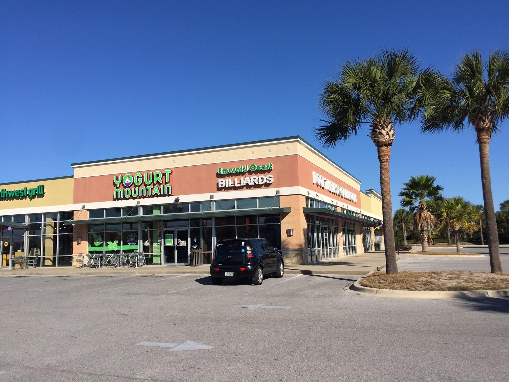 985 Palms Station is an outparcel development of the Winn Dixie shopping center. This suite is currently occupied by Emerald Coast Billiards. The space was originally Rotolo's Pizzeria. This location's primary use is for restaurant. The front of the space has an open dining room with a built in bar. The kitchen area is large providing a Hood system and lots of space for prep and service. There is tremendous amounts of signage available above the storefront, on the monument and on the digital signage. Come join the synergy in this neighborhood. Tenant mix contains Fuji Japanese Buffet, Moe's SW Grill, Yogurt Mountain, Target, Winn Dixie and many others.