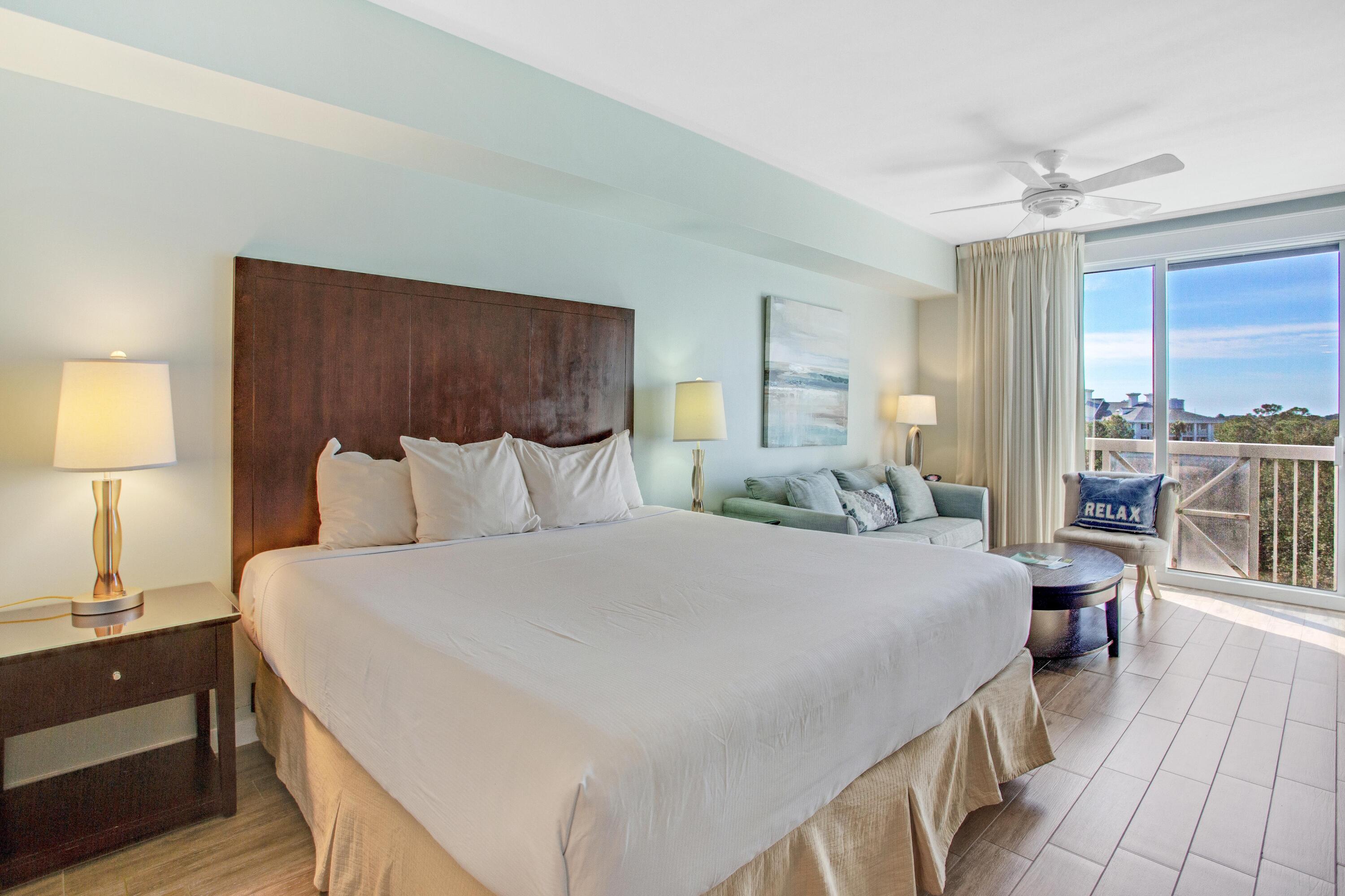 This 6th floor updated studio offers refreshing views of the Grand gardens, resort style pool, and Choctawhatchee Bay from your own Juliette balcony. Porcelain plank tile flows throughout for low maintenance and clean up. This resort condo is offered fully furnished with a king size bed, new sleeper sofa and sitting chair, and a kitchenette with mini fridge, sink, and coffee maker. As an owner at Elation, you will enjoy underground parking, resort style seasonally heated pool, hot tubs, and access to the private Solstice Club where you can entertain while taking in the breathtaking sunsets on the Choctawhatchee Bay. Prime location adjacent to The Village of Baytowne Wharf, a pedestrian scenery with shops, dining, playground, live music and more.