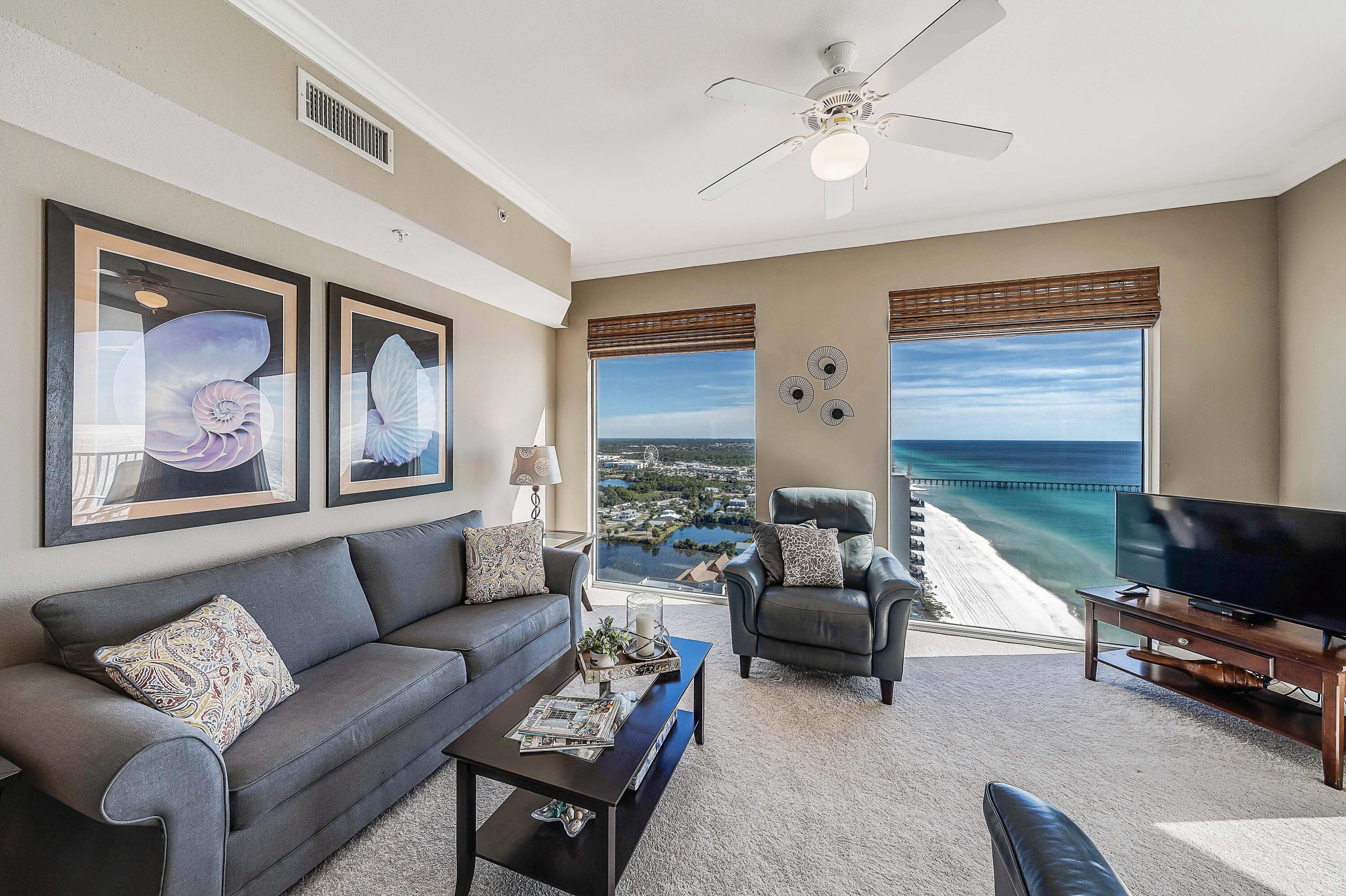 LOOK AT THIS VIEW!!! This penthouse level condo is one of the desirable ''N'' plans and has one of the best views in all of Panama City Beach! This 1 bedroom, 1 bath with bunks features higher ceilings with floor to ceiling windows that will take your breath away, with a spacious corner balcony showcasing the most amazing views all the way down the beach. Perfect to take in the scenic and gorgeous crystal blue waters and white sandy beaches. (as well as the ideal spot to watch the fireworks - best seats to be had for 4th of July and New Years Eve!) This unit comes with one of the large storage units right on your same floor. Tidewater has incredible amenities including 2 outdoor pools, whirlpool, heated indoor pool, movie theatre, game room, fitness center, private owner room on top floor