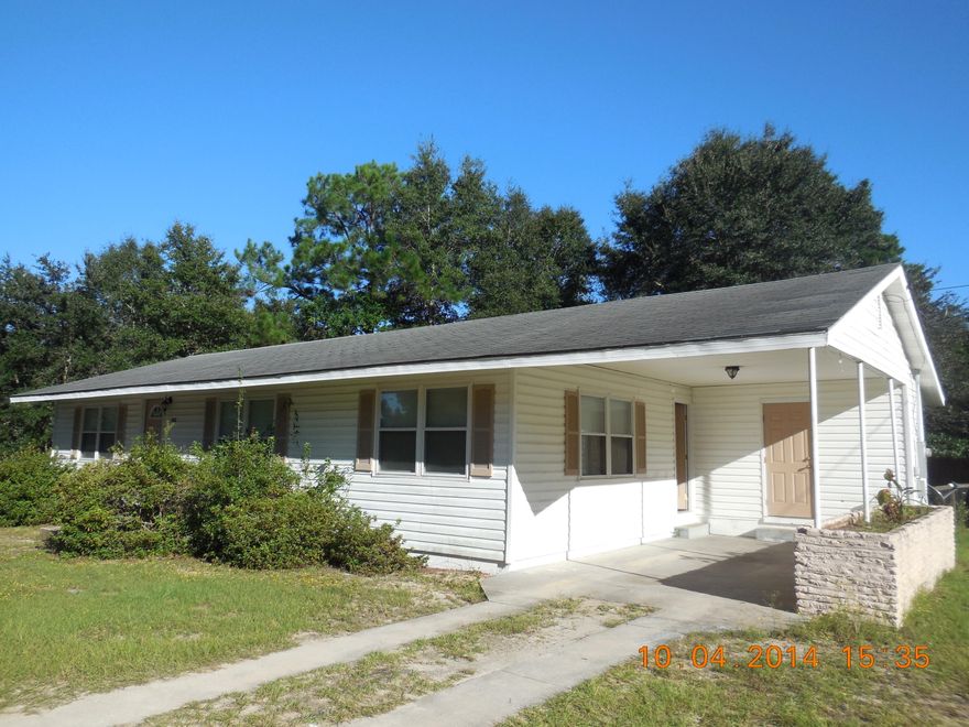 Great Home in a Great Location...just off Hwy 331 North. Close to everything historic downtown Defuniak Springs has to offer.This 3 bedroom home offers a master bath and a guest bath! It also has a roomy living room and an eat-in kitchen. Off the kitchen is another room that could be a dining room or an office or another living room! There is an attached 1-car carport that has the laundry room attached to it. Both the front and back yards are very large...0.3 acres!