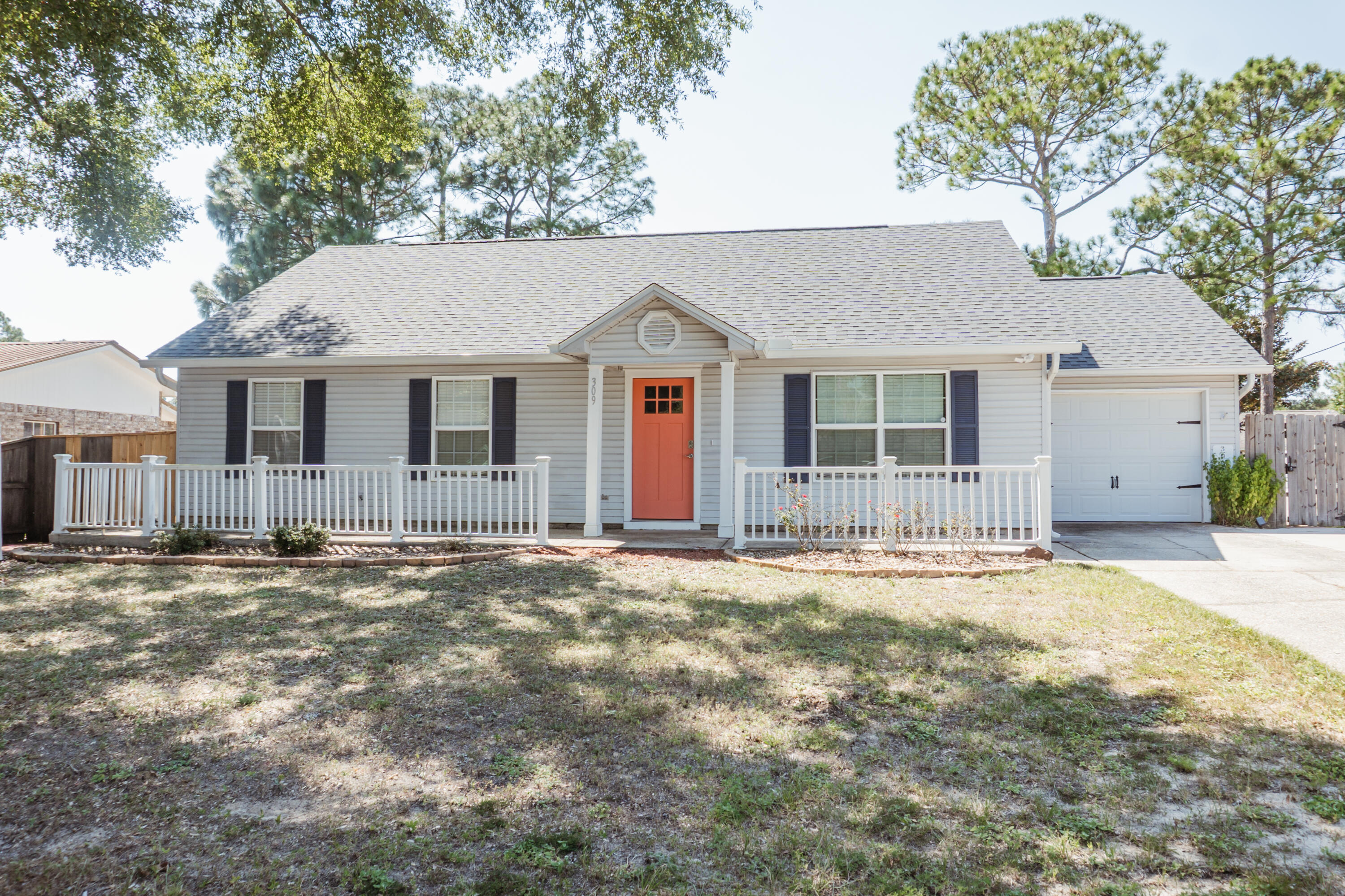 Available Now...Immaculate and beautiful 4-bedroom 2 bath located in South Crestview. Recently renovated kitchen has nice white cabinets, granite, kitchen island, and built in bench in the eat in kitchen area with ship lap accents. Stainless appliance package with natural gas stove. Newer paint features natural and neutral tones in the home. The white cabinets and granite counters are carried through to the bathrooms. Tile flooring in the home, open back deck, spacious back yard with privacy fence. No inside smoking or vaping. Pets allowed with owner approval and pet fee. Oversized driveway and yard building. South Crestview convenience with easy access to bases, beaches and shopping.