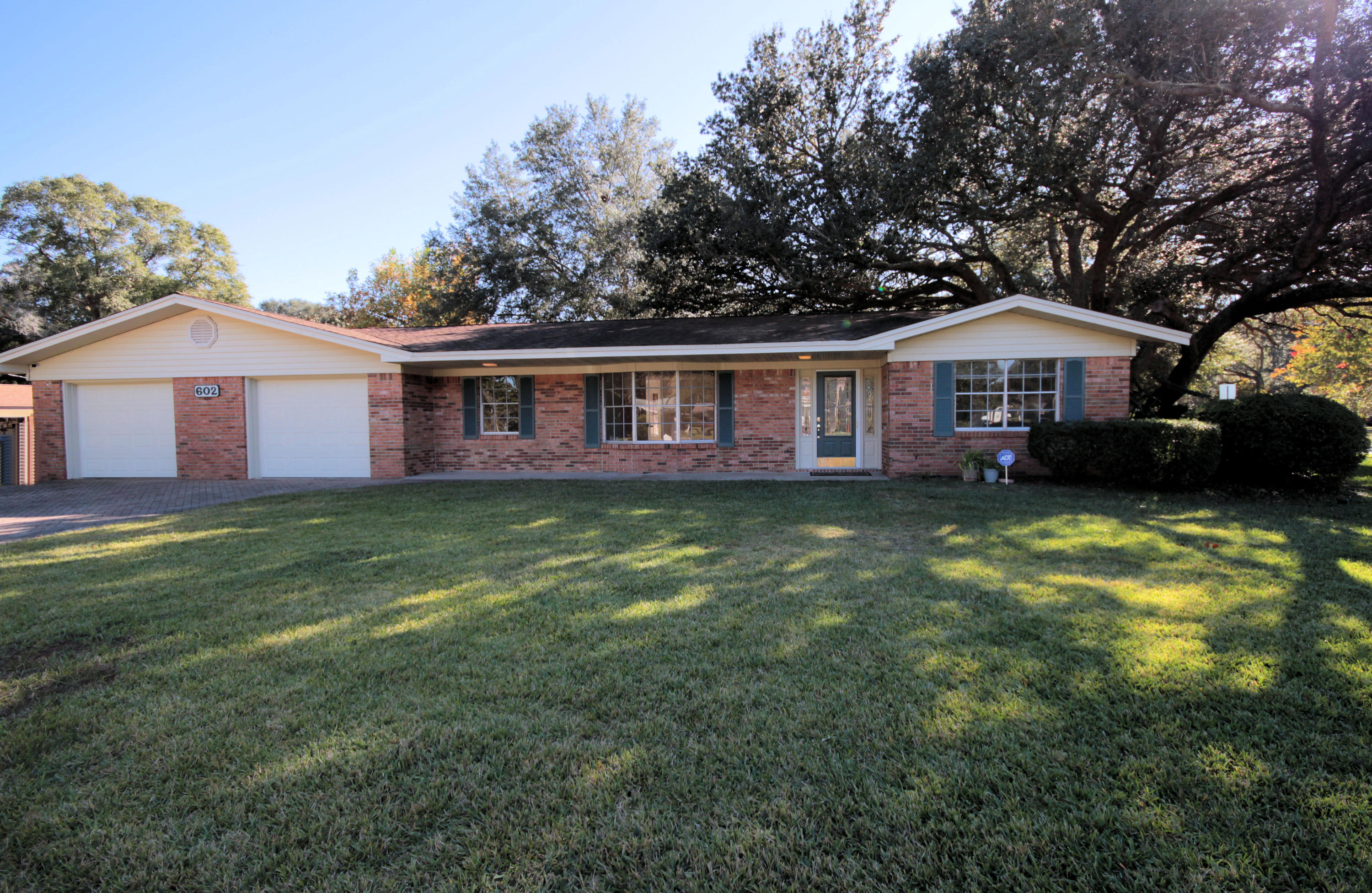 This is IT! UPDATED ALL BRICK Home in KENWOOD! This Corner Lot Estate has Great Curb Appeal and Space Galore! Original Hardwood has been uncovered and is just beautiful. Kitchen with Eat-In Area Underwent a Makeover and is Ready for the New Chef. Designated Dining Area with Picture Windows. Wide Open Living Spaces. Master Suite includes a Walk-In Closet added by the seller and measures the length of the room. Also a wet-sink area that could be an awesome Coffee Bar. 3-Car Garage! One side tandem and the other single, leaving lots of room for garage tools and lawnmower! Laundry Room is Huge with a Built-in Desk, Pantry and 1/2 Bath. Would make a great Home-School Room or Craft Room! Park-Like Backyard is Gorgeous with room for a Pool. Make it Yours!Buyer to verify measurement