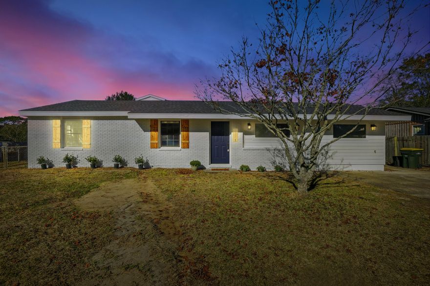 Completely renovated and expanded, this stunning 4-bedroom, 2-bath home offers 2,134 heated square feet of modern coastal living in Fort Walton Beach. The open floor plan features Luxury Vinyl Tile throughout the main living areas and new carpet in all bedrooms. The gourmet kitchen showcases quartz countertops, stainless steel appliances, a center island with cooktop, and a dedicated coffee station/bar nook. The spacious primary suite includes a vaulted ceiling, his and her walk-in closets, and a spa-like bath with double vanity and large walk-in shower. Major upgrades include a new roof, new electrical, new plumbing, new exterior siding, new windows, and new doors. Truly turnkey and move-in ready.