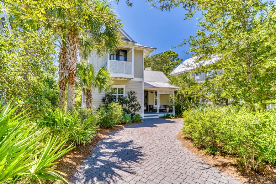 Tucked inside the exclusive gated community of The Hammocks, 47 Hammock Lane is your serene retreat just moments from the Gulf, nestled between WaterColor and Seagrove Beach. This 3-bedroom, 4-bath home combines timeless craftsmanship with a coastal ease that's perfect for both everyday living and beachside getaways.Step inside to find wide-plank reclaimed hardwood floors, soaring vaulted ceilings, and an open-concept layout designed for gathering. The chef's kitchen features premium stainless steel appliances and overlooks the living space anchored by a gas fireplace. Each bedroom is generously sized with ensuite baths, offering comfort and privacy for family and guests alike.A sun-drenched Florida room--surrounded by windows and finished with slate floors--adds flexible living space that can serve as a guest suite, office, or additional lounge. Outdoor spaces provide privacy and room to relax, and the location offers convenient access to nearby dining, shopping, and beach access points along 30A.

The Hammocks offers two neighborhood pools and a peaceful boardwalk leading to Western Lakeideal for launching a paddleboard or kayak. Whether you're looking for a primary residence, a second home, or a standout rental opportunity, this home is a rare chance to own in one of 30A's most desirable pockets.