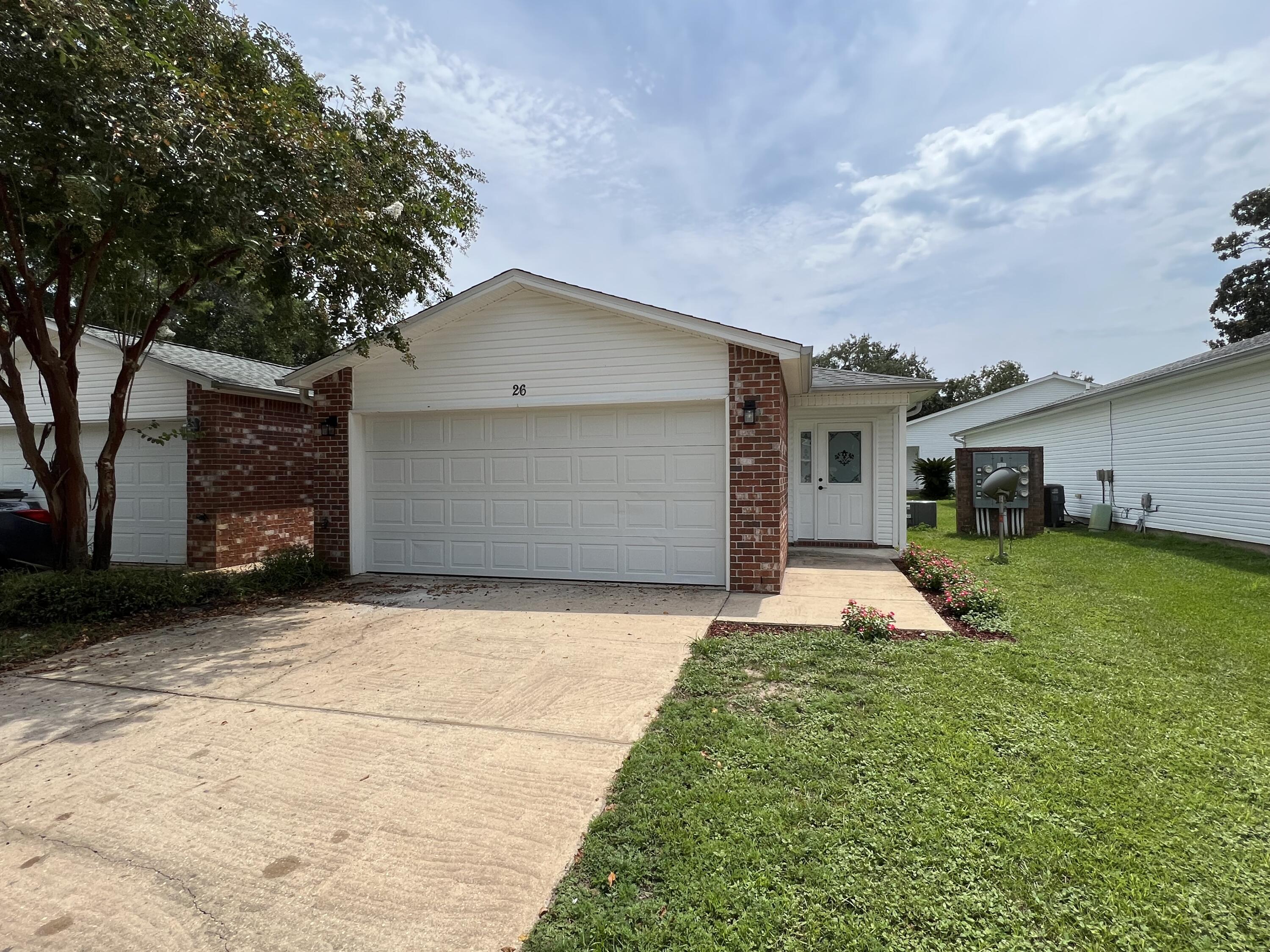 This REO is Ready to Go Now! This super cute and conveniently located single story townhome has it all. Located just off Hwy 98 and 2 blocks from the Mary Esther Fire Department, you will be amazed at how close to everything you will be! This move in ready home has 2 bedrooms, 2 full baths, recessed lighting, a large open floor plan with tile in all area except bedrooms - where LVP was recently installed. Home has granite tops in kitchen and baths, new fixtures throughout, (including new stainless steel appliances), new dimensional shingled room, HVAC and more! This NO HOA Townhome also has brick front, vinyl siding, and screams ''buy me now!'' Don't wait too long, or this move in ready home will be gone!