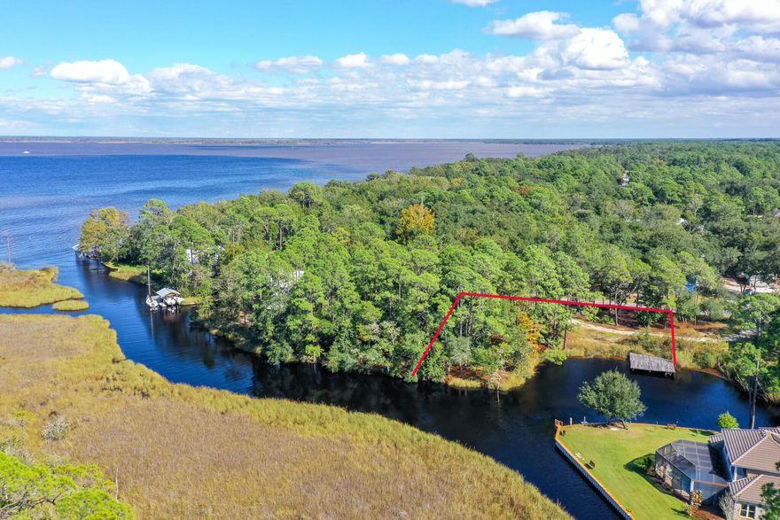 Beautiful water front property located in Point Washington. Nearly half an acre situated along Little Canal with deep water access to the Choctawhatchee Bay. Plans are already designed for this property to take advantage of sprawling 180 view, including views of the Bay. Full architecture plans provided upon request.