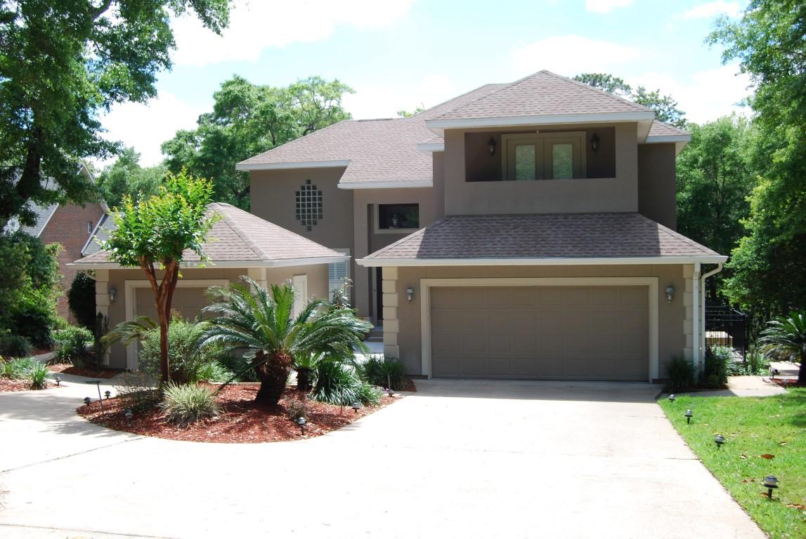 OPEN HOUSE CANCELLED FOR SUNDAY 07/09/17- CONTRACT PENDING. STUNNING!! Best describes this Home in one of Niceville's most prestigious neighborhoods. Three story home with over 3800 square feet of living area, (3444 inside plus 400 downstairs room), with and in-ground heated swimming pool and a three car garage. First floor features a Formal living and dining room, beautiful hardwood floors, a huge kitchen with a center island, gas cooktop, double ovens, lots of cabinets and plenty of counter space with granite tops and best of all it is open to a large Gathering room which features built in book cases. a built in TV with surround Sound and patio doors opening to a large covered balcony overlooking the Swimming Pool and