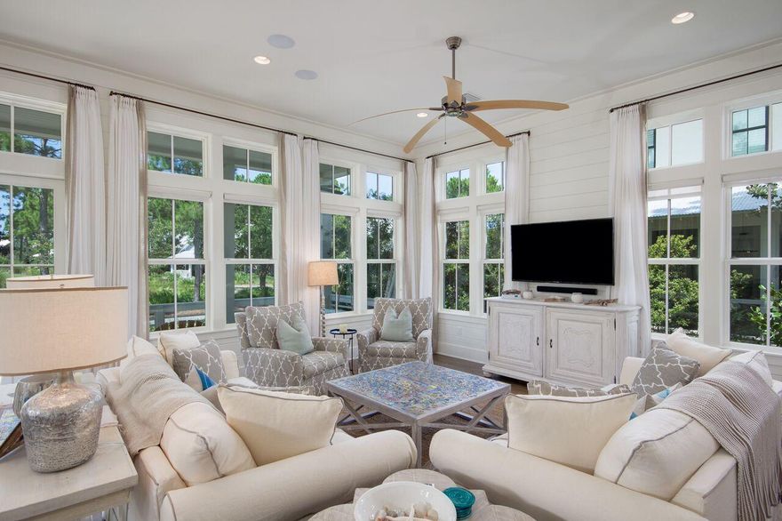 Custom home masterfully built by Romair construction and finished with the highest level of finishes. This elegant and well-designed home exemplifies the best of southern coastal architecture and is well positioned in the popular second phase of WaterColor. Inside, this exquisite home offers 4 large bedrooms (2 master suites), a spacious bunk room with 4 bunks, large living room with high ceilings and exceptional natural light, a dream kitchen with marble counter tops, Wolf/Sub Zero appliance pkg, and an enlarged dining room with ample seating for the entire family. Outside, this home features 3 porches - one which is screened and presents a great outdoor tv area complete with fireplace. Lot is irregular in shape and will accommodate a pool, carriage house & garage. This is a must see home