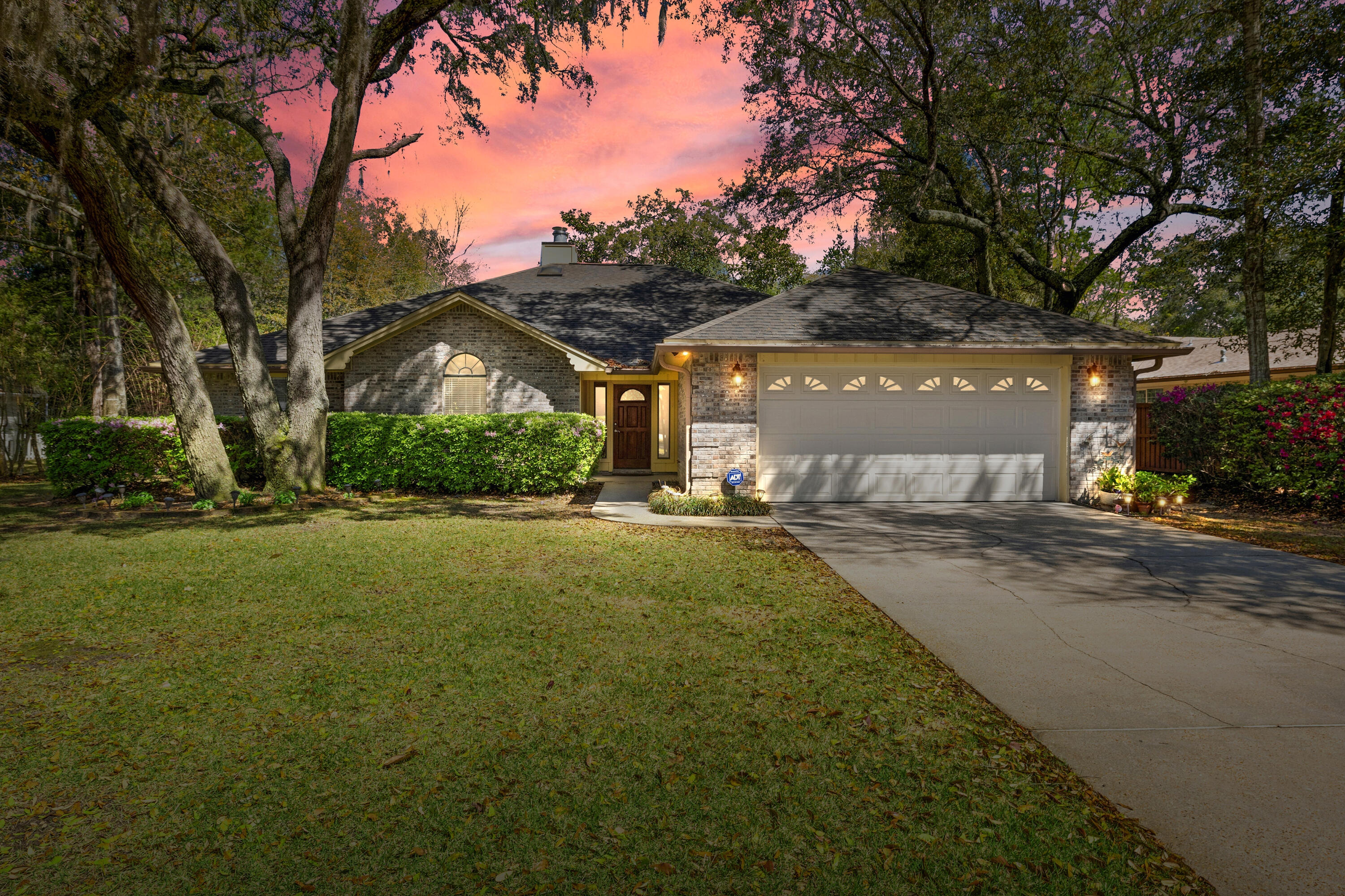 Experience Serenity in This Charming Brick Home on a Cul-de-Sac nestled in a peaceful setting. This beautifully crafted brick home offers thoughtful updates with every corner of this home exuding warmth and style. Step into the spacious open kitchen, where tile flooring, granite countertops, and custom cabinetry create a chef's dream. Stainless steel appliances, cooktop, built-in wine rack, and a cozy breakfast nook with additional storage make this space both functional and inviting. The master suite is a true retreat, featuring double vanities, a cabinet organizer, a custom-tiled walk in shower, a spacious 6 foot whirlpool spa with lights and a heater, plus a dedicated jewelry cabinet. The guest bathroom also boasts stunning granite countertops and a newer vanity. The great room is perfect for cozy evenings, featuring a gas fireplace and a flat-screen TV. Additional highlights include multiple linen closets and a coat closet, a formal dining room with elegant chair rail detailing, and a laundry room equipped with custom cabinetry to match the kitchen. A convenient half bath off the laundry room adds to the home's thoughtful design. Relax and unwind in the fully heated and cooled Florida room, bathed in natural light from overhead skylights, or enjoy the outdoors from the screened-in patio. The backyard is a private oasis with an open patio, a play set and raised garden bed. The newer HVAC system has Wii Fi capability and has an ionizer to improve air quality.
This home is a rare find, blending modern conveniences with tranquil surroundings. Come experience the comfort and charm of 341 Oaklake Lane for yourself!