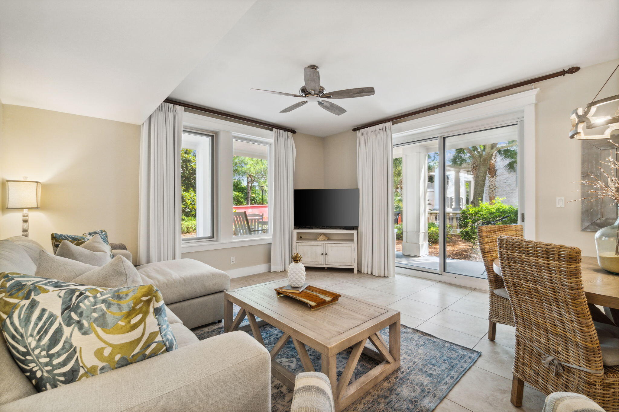 Rare opportunity to own the only available, ground-floor lockout with wrap-around porches in the highly sought-after Lasata, located within the exclusive gates of Sandestin Golf and Beach Resort. This thoughtfully updated and elegantly decorated condominium gives you multiple income potentials as you can rent as a 1 bedroom, 2 bedroom, or a studio. The open concept main unit has updated stainless appliances, full size, stackable washer/dryer, beautiful finishes and an abundance of natural light throughout. The spacious master bedroom includes a king bed and seating area, overlooking the Baytown Avenue green space. The connecting studio is offered with two queen beds, private bathroom, full kitchenette and a private porch. Both units have new HVACs in '21 and a new roof in May of '23.