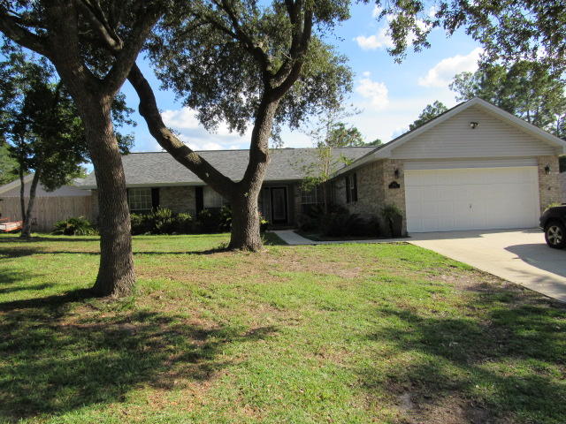 South Crestvew! Pool Home with a Detached Workshop... Prime location, 1 red light to Duke Field, 7th Special Forces and a quick access to I-10. This home has all you need to enjoy life while staying at home. The home office is currently used as a sitting room. This comfortable home has a lot of action packed features a swimming pool for Mom, a workshop for Dad, a screen porch and large patio to entertain guest. The living room features a fireplace for cozy evenings. The kitchen is a main feature with lots of counter and cabinet space. The laundry room has extra cabinet and counter space, no shortage of storage or closet space. The guest bedrooms and bath are spacious. The master suite will handle all your large furniture. Don't blink this beauty will be gone!