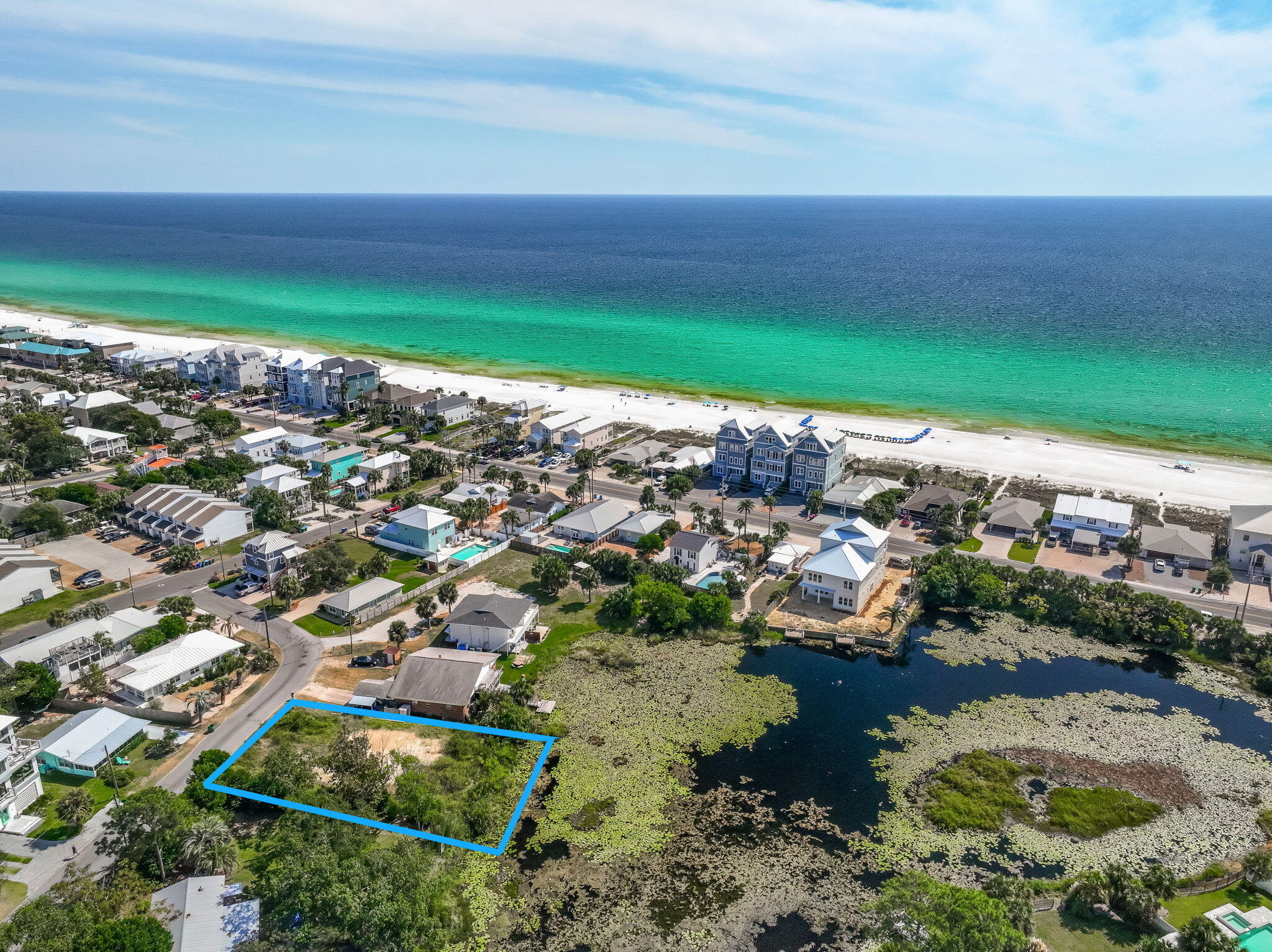 Rare lakefront lot in laid-back LAGUNA BEACH! Just 700 ft from beach access to emerald waters and powdery white sands. Build your dream home or a top rental--with no HOA! Bike to beloved local favorites Thomas Donuts and The Carousel Market. Minutes to Pier Park's 120+ shops, restaurants, and Grand IMAX theater, SkyWheel, concerts and more! AND only 5 miles to 30A's stunning beach towns and upscale dining! Laguna Beach is one of the most sought after areas of Panama City Beach! PRIME coveted location with endless potential--do not miss this one!!