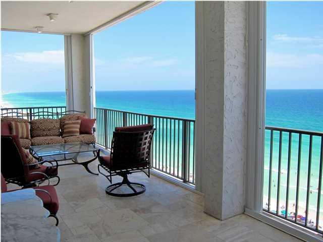 PENTHOUSE residence in exclusive rental restricted development. Enjoy a coveted location on the ''world's most beautiful beaches''. Stunning 12th floor condo spans across 60ft. of gulf front and features over 4,000 sq. ft. of indoor and outdoor living space. Cleverly redesigned and ideal for both second homes and full time residents. You will appreciate the solid construction and attention to detail in this home: wood and stone flooring, solid wood trim and moldings, soaring ceilings and walls of windows. Thoughtfully styled with classic design and luxurious touches. Presented fully furnished, with accessories and custom linens included. Well-appointed Master Suite boasts panoramic gulf views, fireplace, custom built in cabinetry and large walk-in closets. The additional