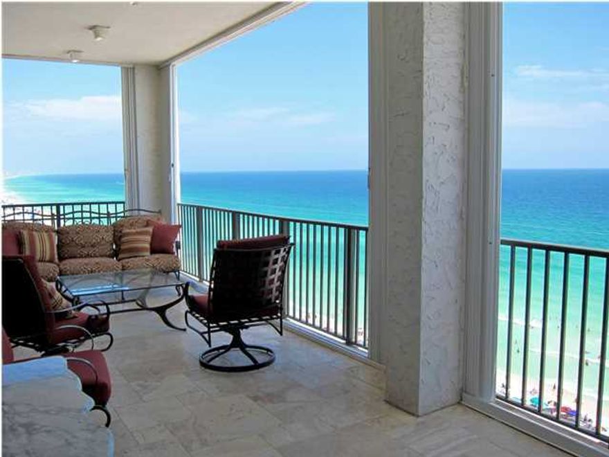 PENTHOUSE residence in exclusive rental restricted development. Enjoy a coveted location on the ''world's most beautiful beaches''. Stunning 12th floor condo spans across 60ft. of gulf front and features over 4,000 sq. ft. of indoor and outdoor living space. Cleverly redesigned and ideal for both second homes and full time residents. You will appreciate the solid construction and attention to detail in this home: wood and stone flooring, solid wood trim and moldings, soaring ceilings and walls of windows. Thoughtfully styled with classic design and luxurious touches. Presented fully furnished, with accessories and custom linens included. Well-appointed Master Suite boasts panoramic gulf views, fireplace, custom built in cabinetry and large walk-in closets. The additional