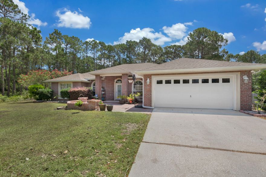 Are you looking for a beautiful, spacious home in the highly desirable Hidden Creek area? Then look no further! This lovely home has all the space you could want with 4 bedrooms, 3 full bathrooms, office space & formal dining or flex space. The gorgeous kitchen features ample cabinet & counter space with maple cabinets, granite countertops, a stunning backsplash, an island with a smooth cooktop, and is open to the very large living room w/fireplace. The master bath has a garden tub & tiled shower as well as a large walk in closet. Nice size laundry room w/a sink. New hybrid hot water heater. Enjoy the large backyard w/covered patio & lots of privacy. Enjoy the multi million dollar recreation area of Holley by the Sea. Just a short drive to beautiful beaches, shopping & military bases.