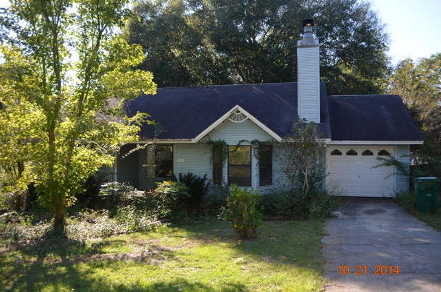 A great location in central Crestview. Built in 1988, this 3 bedroom 2 bath home has a sunroom addition just off of the kitchen, large open deck on the back of the home, covered front porch, and all vinyl siding. The interior needs some work, making this home a great buy for a handy person or investor looking for a rental purchase. Large fireplace in the living room with vaulted ceilings. The master bedroom and 2nd bedroom both have bay windows, making this rooms quite appealing. Call today and set up your viewing of this one as it will not last. ** Employees and family members residing with employees of JPMorgan Chase Bank, N.A, its affiliates or subsidiaries are strictly prohibited from directly or indirectly purchasing any property owned by JPMorgan Chase Bank, N.A. **