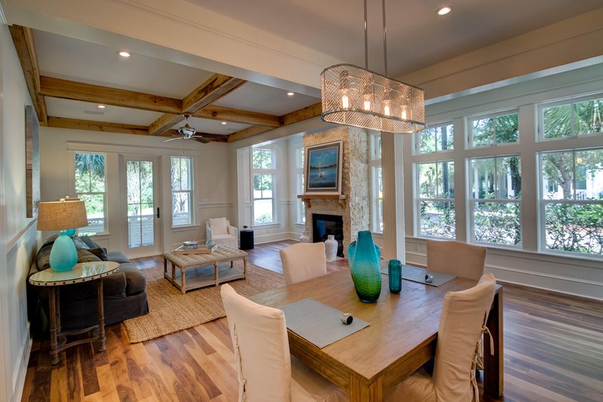 Brand new construction luxury home by Syed Design Group in Cottages at Eastern Lake! Located south of 30A, this home is only a short walk from beach access and a block from the community pool. High-end interior finishes include: solid walnut hardwood and tile floors; custom cabinetry; granite countertops; all stainless steel appliances including gas range; tankless water heater; and more. Inside, the open concept first floor features a gas fireplace and rustic peckey cypress beamed ceilings in the spacious living area, as well as an inviting kitchen island. A spacious driveway and 1-car garage offer plenty of convenient parking. After a long day playing on the beach, the outdoor shower is perfect for washing off the sand and salt without tracking it into the house.