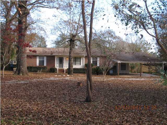 COUNTRY LIVING JUST MINUTES FROM CITY LIMITS!! All brick 3/2, 1476sf home on 1.5 acres!! Lots of open area along with great house. Step up onto front porch to enter through storm door to living room. Ahead to dining/kitchen, left to extra bedrooms & to right Master. Laminate flooring through living room, bedrooms, hall, HUGE walk-in closet & office/exercise room. Tile in all other rooms and wait till you see the tiled master shower & bath!! Kitchen fully equipped with smooth-top stove, dishwasher, micro-hood & refrigerator w/ice maker. Large laundry with plenty of shelving. Master bath has skylight and totally tiled shower with seats (GOTTA SEE)!. Master B/R has large shelved closet and then EVERY WOMAN'S DREAM- HUGE WALK-IN CLOSET/DRESSING AREA!! On the other side of closet there is