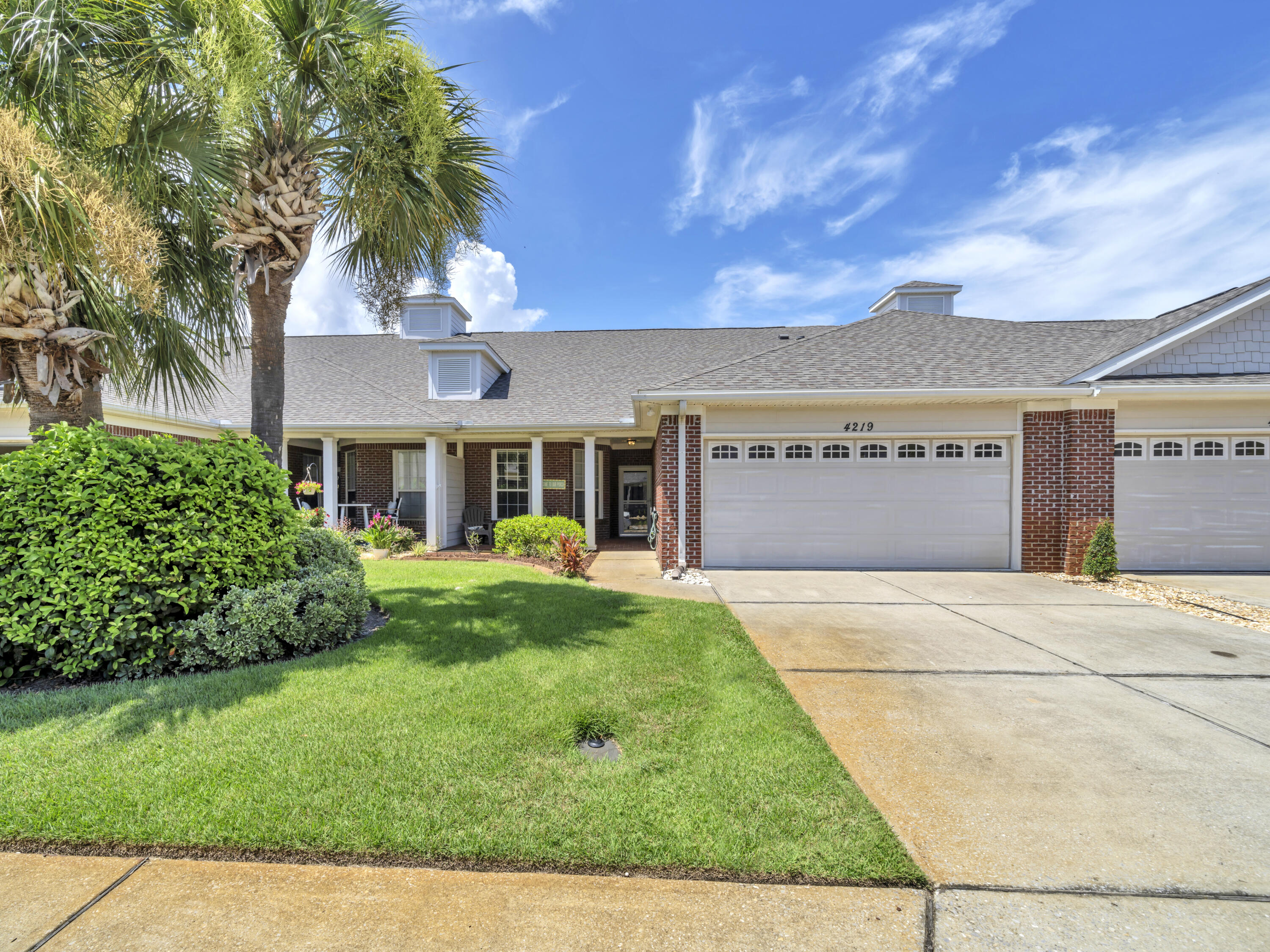 This beautiful 3-bedroom, 2-bathroom residence offers a perfect blend of comfort, elegance, and Florida charm.Step inside to find an open-concept living space with high ceilings, abundant natural light, and updated finishes throughout. The spacious kitchen boasts quartz countertops, stainless steel appliances, a breakfast bar, and ample cabinetry. The master suite features a walk-in closet, en-suite bath with a soaking tub, walk-in shower, and double vanity.Enjoy peaceful evenings on your screened covered patio overlooking landscaped backyard. The home also includes a two-car garage and a dedicated laundry area.Located in a well-kept, HOA community close to shopping, dining, parks, and top-rated schools.