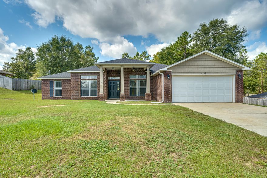 Beautiful North Crestview home on 6/10 acre!  From the moment you enter through the front door you will notice the natural light that fills the home. The open floor plan makes the home perfect for entertaining.  The kitchen is sure to please the chef in the family with its sleek granite counters, sharp stainless steel appliances, staggered cabinetry with crown molding, and clean ceramic tile floor. The master suite is located at the back of the home and has a pleasant view into the back yard.  The master bath has jetted garden tub, double vanity, 2 closets, and separate shower. The additional bedrooms are all quite large and should accommodate most any furniture layout.  Please also note the home's additional builder upgrades: french doors, brick mailbox, attic stairs, garage door opener,