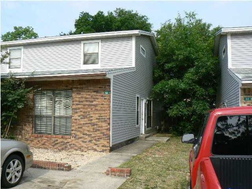 Roomy 2 story townhouse. End unit. 2 Bedrooms - one downstairs - one upstairs. NO PETS ALLOWED.