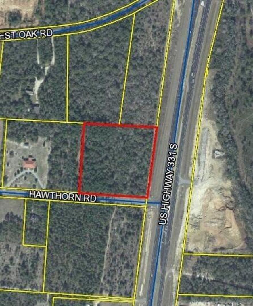 This 5-acre parcel is situated at the intersection of US Highway 331 and Hawthorn Rd, positioned just north of Freeport, Florida, and south of Defuniak Springs, Florida. The property boasts approximately 450 linear feet of frontage along US Highway 331, with the northern side extending about 460 feet in depth and the southern side approximately 430 feet, running along Hawthorn Rd. Utilities such as public water, gas, cable, and electric are available, with installation preparations required. The land is currently wooded and zoned as Estate Residential per Walton County's GIS map, while the adjacent parcel to the south is designated for Heavy Industrial use. It's important for potential buyers to verify all zoning regulations. A current survey of the property is available for review.