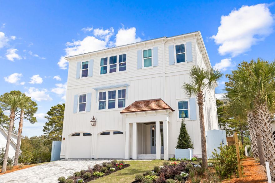 For those dreaming of a beach house beyond the ordinary, take a look at this brand-new, one-of-a-kind custom beauty.  Complete with designer wallpaper, feature lighting, handpicked artwork and high-end furnishings by local designer, Apres Sun,  it's quite unlike anything else on the market. Every space has been thoughtfully honed to combine European aesthetics with practical functionality. Rising from street level, this three-story home is fronted by a wide paved driveway and lawns edged with color-filled flower beds. A two-car garage accommodates vehicles, bikes and beach toys, while a covered porch frames the grand entrance. Explore the spacious pool room with sitting area, the laundry, bunk room and the pool bathroom on this level. On the second floor, wood flooring perfectly contrasts the light stone archway, which separates the dining area and the comfortable sitting room from the chef's kitchen. Imagine entertaining and memory-making with family and friends in this attractive space. A kitchen island provides seating for snacks and everyday mealtimes. White-washed walls, stainless steel appliances and veined quartz countertops enhance every inch of this enviable chef's domain. A butler's pantry and a custom hood over the range are just some of the added delights. A half bathroom and the first of two master suites complete this level. You'll want to check out the spacious walk-in closet and the stunning master bathroom with custom tile. 

The third-floor master suite is a peaceful sanctuary of tranquility. It includes a custom walk-in closet and a master bath with accent wallpaper above the twin vanity. The covered porch is perfect for enjoying private moments of relaxation at the start and end of each day. A cozy sitting area, laundry, and three additional bedrooms complete the generous accommodations. The loft is cleverly used as an additional TV area with a beverage refrigerator and bar for guests to help themselves to an array of drinks and snacks. Bathrooms have been individually designed using stylish tile and frameless glass shower doors. 

Outdoors, the rear fenced yard is centered on a contemporary heated pool complete with a tanning shelf and visual water jets. The pool view can be enjoyed from multiple balconies and outdoor relaxation areas. A lengthy covered gazebo provides the perfect place to unwind or dine with friends. For morning walks, stroll along the nearby white sandy beach and watch diving pelicans and playful dolphins in the beautiful gulf waters. Three beach access points and a nearby golf course create a retreat that's a coastal paradise beyond compare. Hop on bicycles, and in just four minutes, you can be browsing the shops and enjoying the live entertainment and restaurants at Gulf Place. Combining exceptional design with high-end finishes and a prime location, this unique residence provides a rare opportunity to experience 30A living at its very best. 