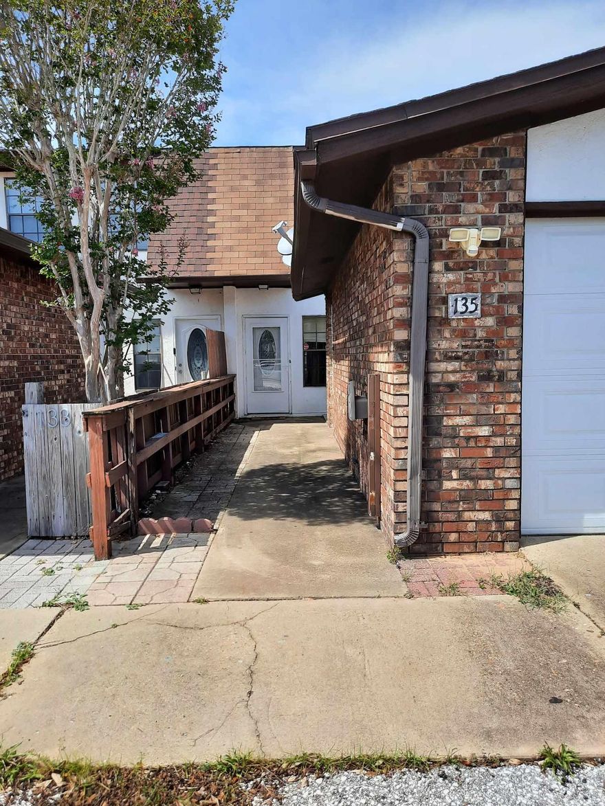 Everything you need right where you need it!  Near EAFB, Beaches, NWFSC, shopping, hospitals and schools.  Great for your family or rental home...and NO HOA!  3 bedrooms, 2 full baths upstairs and 1/2 bath downstairs, lots of closets, 2 pantries in the kitchen with a new garbage disposal and refrigerator that is less than 2 yrs old. A/C recently serviced and refurbished. A back patio and upstairs patio provide expanded living spaces to enjoy.  Laundry room off the back patio offers convenience and the washer & dryer stay with the house.  A garage with work space, you're all set!  To see this fine, functional, pet friendly home with a fenced back yard, call your Realtor today!