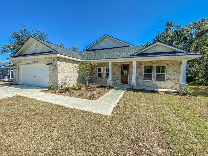 Back on the market at no fault to the seller! Beautiful brand new 4 bedroom 3 bath home. Second bedroom has an attached bathroom, perfect for a mother in law suite! Short distance to elementary schools, and convenient to area shopping and restaurants. It is just minutes away from the white sand and emerald waters of Navarre Beach! 9 ft ceilings throughout the main living areas with a trayed ceiling in the dining and master bedroom. Luxury vinyl plank flooring, and Quartz countertops throughout. Oversized laundry room. Large covered back patio perfect for entertaining. Automatic irrigation system and 6ft wood privacy fence with gate included.