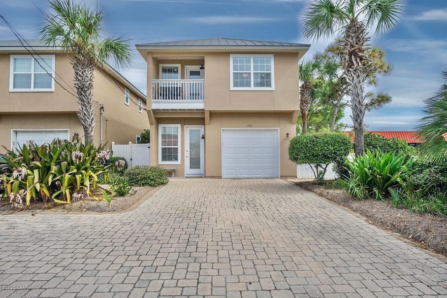 I love this Gulf View home for so many reasons. This end unit at the 'Villas Of Panama' is a fantastic location, right across the street from the Gulf!  This home is lovely. It has new flooring, new furnishings and is sold furnished. Perfect for a second home or a beach rental! Each Bedroom has its own balcony. The master suite has a balcony facing the Beach, the other two bedrooms have a balcony that overlooks the courtyard and pool. There is plenty of parking for guests with the garage and an oversized  driveway.  The location is brilliant! Close to restaurants, entertainment and of course the beach! This community has it's own private courtyard and pool for the owners and renters. This unit is in beautiful condition and has never been a rental although short term rentals are permitted.