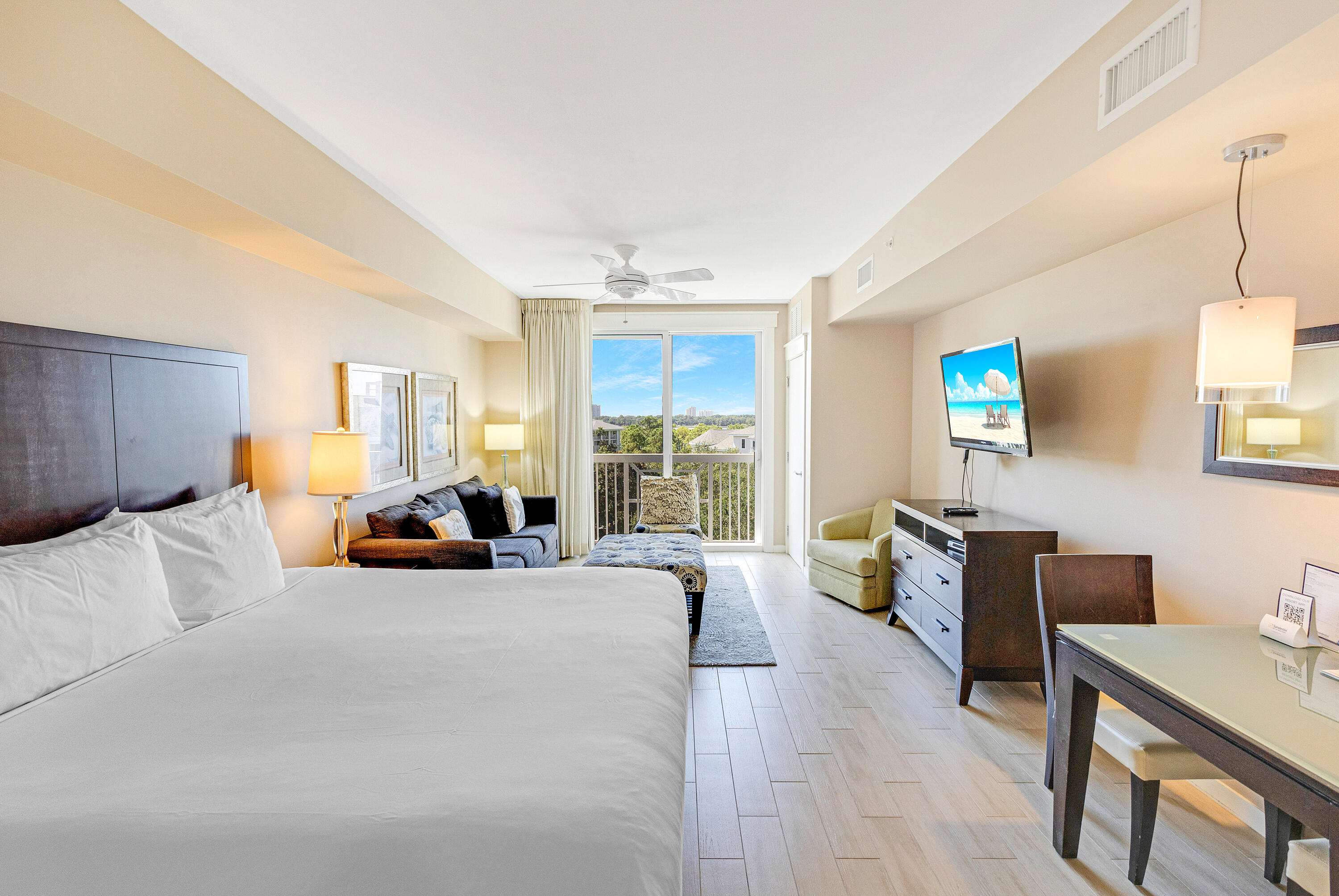 This pristine 7th-floor studio offers stunning Bay views and a bright, coastal-inspired design. Featuring durable LVP flooring and soothing coastal tones, the condo is fully furnished and rental-ready. Enjoy the convenience of a Juliet balcony, perfect for fresh air and taking in the peaceful surroundings.Elation is located adjacent to the lively Village of Baytowne Wharf with its shopping, dining, family-friendly activities, and vibrant nightlife. Owners also enjoy access to the private Solstice Club--complete with outdoor grills, a screened porch with a gas fireplace, an indoor bar, flat-screen TV, and inviting lounge areas both inside and out. As an introduction to the Sandestin lifestyle, we invite our new owners to explore amenities that make Sandestin special. The listing brokerage and seller(s) are presenting the buyer(s) of this property with (2) 90-minute rounds of Tennis court time, a golf foursome at one of our three championship courses, and a round of golf for up to four (4) players at the unrivaled Burnt Pine Golf Club.
Sandestin Golf and Beach Resort features more than seven miles of beaches and pristine bay front, four championship golf courses, 15 world-class tennis courts, a 226-slip marina, a fitness center, spa and celebrity chef dining. Shop, dine and play at the charming pedestrian village, The Village of Baytowne Wharf and more. Inside the gates of the resort, residents enjoy a balanced lifestyle of high-class living, spanning the 2,400 acres from the beach to the bay. Everything within the gates of the resort is accessible by golf cart or bicycle. The entire resort is interconnected by miles of pedestrian, bike and golf cart paths that weave through groves of live oaks, meandering past natural lagoons, fountains, man-made lakes, and meticulously landscaped fairways.