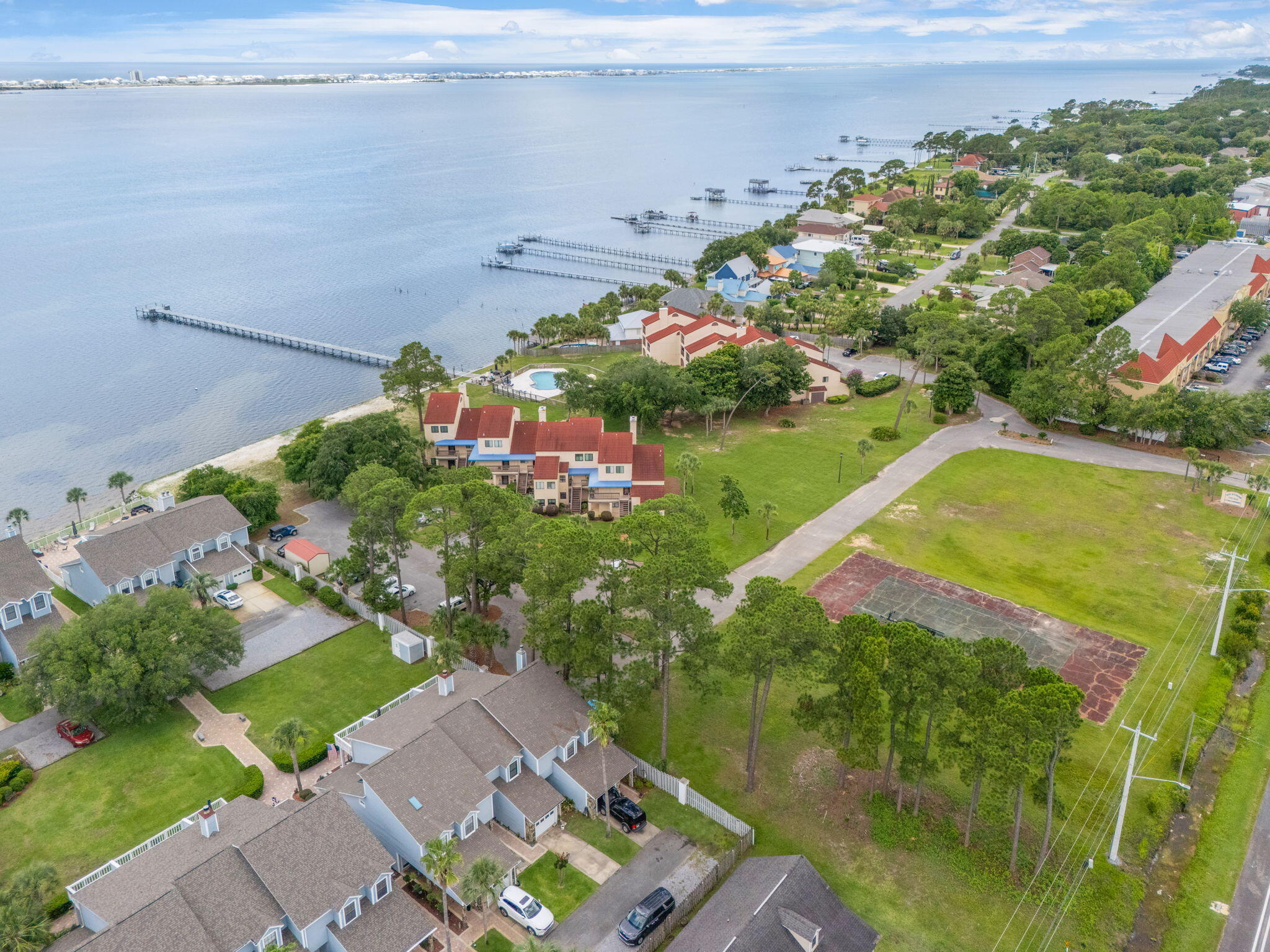 ***NO HOA GATED COMMUNITY*** Waterfront Investment Opportunity in Navarre. Zoned Multi-Family. Discover the potential of this exceptional waterfront property in Navarre, Florida with gated access. This property presents a rare opportunity for developers and individual buyers alike to secure a piece of paradise along Florida's stunning Gulf Coast. With flexible investment options, buyers can choose to partner with the seller to develop up to four rental units, capitalizing on the high demand for waterfront rentals in the area. Alternatively, you can customize your investment by purchasing the entire development or just purchasing one of the units being developed, making it an ideal choice for those seeking a luxurious coastal getaway or a profitable rental property. Seller has access to