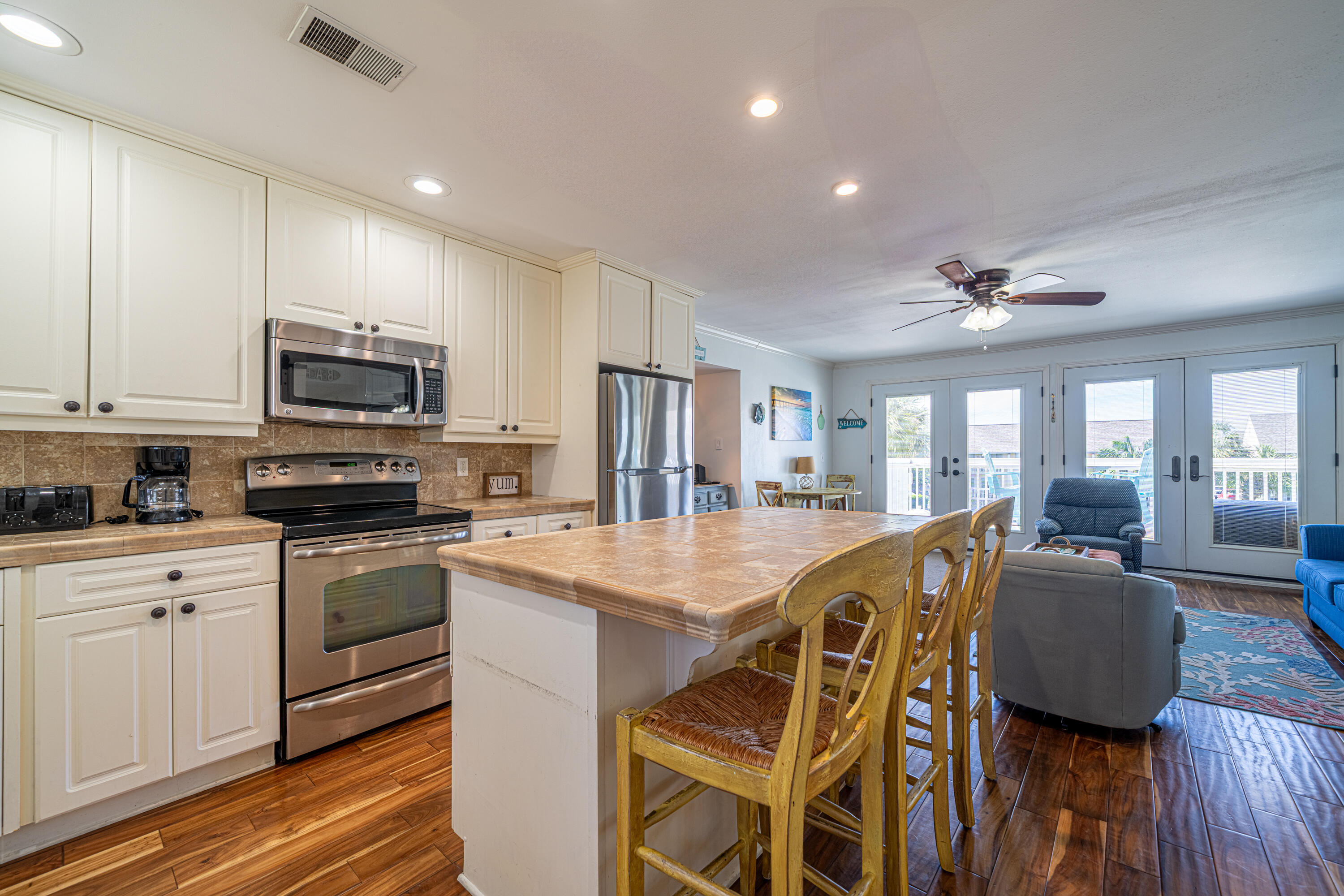 GREAT LOCATION! Beautiful and spacious 2 bed, 2 bath with views of the canal in Sandpiper Cove! The heated pool is just across the parking lot. Enjoy a large, extended Trex deck...perfect for relaxing or entertaining. Kitchen features an open layout with island, recessed lighting & stainless appliances. Big ticket items like HVAC & water heater are recently replaced. New refrigerator and washer dryer in 2024. Sandpiper Cove is a 43-acre gated community with private beach access, 5 pools, pitch-and-putt golf course, marina and boat launch, canal access, 24/7 security, and brand-new pickleball and tennis courts. Enjoy drinks at the new beachfront bar, The Sand Flea, or dine at the on-site restaurant, Louisiana Lagniappe. With unbeatable amenities, this is the perfect place to be!