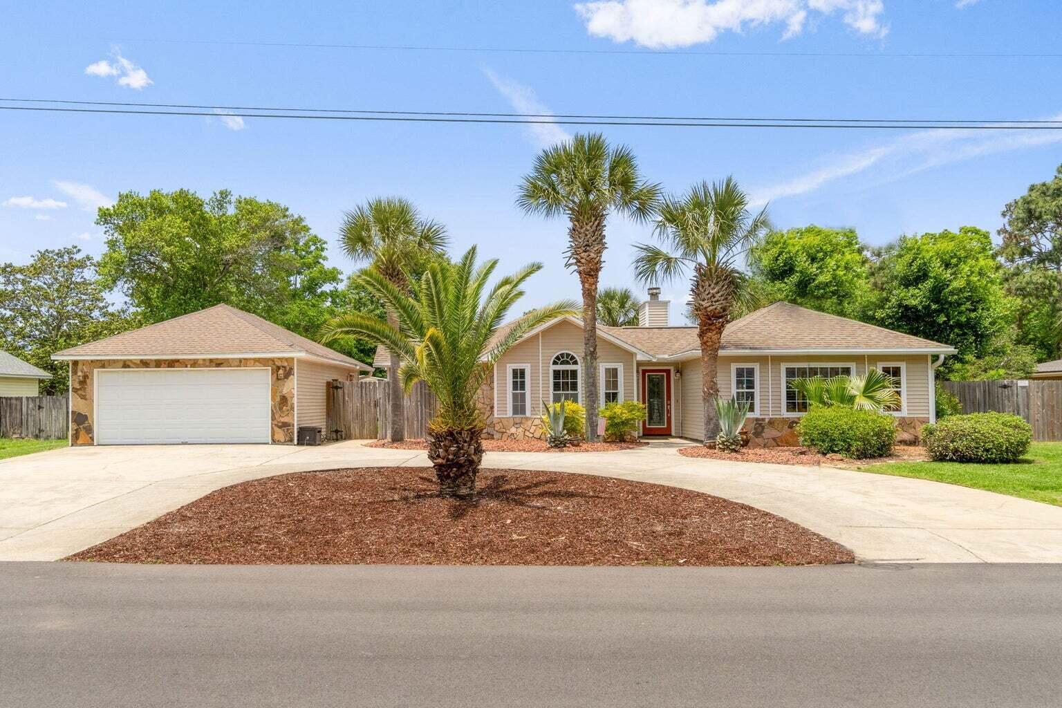 Gorgeous Pool home located on the east side Navarre just a quick hop over to the beach, shopping, restaurants or Hurlburt.  Outstanding features including:1. Spacious Bedrooms: Three generously sized bedrooms.2. Open Floor Plan: The open floor plan seamlessly connects the kitchen, dining area, and living room - creating a welcoming and versatile space for family gatherings and entertaining guests.3. Gourmet Kitchen: The well-appointed kitchen features appliances replaced within last 2 years, loads of cabinet space, hard surface countertops and a large pantry area with easy access to back yard for grilling! 4. Great exterior: Vinyl siding, oversized circular w/ plenty of room guests or a RV/boat. 5. Tranquil Backyard: Private, spacious oasis complete with 2 beautiful covered patios, lots of green space for games or gardening, a large shed, huge fire pit AND the outstanding pool!
6. Tile Flooring: The house is adorned with beautiful tile flooring throughout! It not only enhances the aesthetic appeal but also ensures easy cleaning and maintenance.
7. Comfortable family room with stunning accent wall and access to the back covered patio.
8.New roof installed Nov 2023
9. Large detached garage with easy access to the kitchen.  
All you could want and more priced sell!
