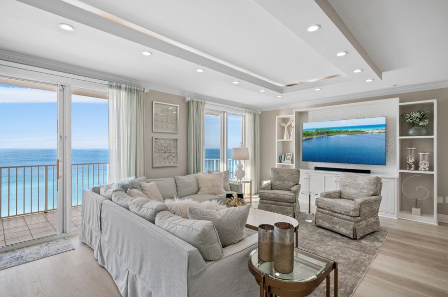 This exquisite, completely renovated penthouse at Majestic Sun will absolutely take your breath away. Situated on the 12th floor, the expansive Gulf views are simply stunning. Offering 3 bedrooms and 3 baths spread through a spacious 2,212 square feet, the unit went through a quarter million dollar renovation in 2021/2022 designed and furnished by the renowned Risa's Interiors. It's expansive upgrades include quartz countertops throughout, new flooring throughout, remodeled kitchen with new cabinets, island and all new LG appliances, custom entertainment center, all new lighting fixtures, new HVAC system, electronic shades in the den, custom draperies in master with custom plantation shutters in guest bedrooms, fresh paint with new trim and baseboards, custom closets, new televisions,