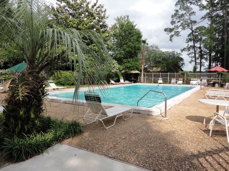 Valparaiso, near Eglin AFB! Built in 1994 this immaculate 3 bed 2.5 bath townhouse on a quiet, friendly cul de sac in Hidden Cove is ready to welcome you home. Driving through the winding oak-shaded streets of this waterfront community you'll pass its many amenities: a clubhouse with exercise room and party space, large gated pool, tennis courts, and best of all, access to Toms Bayou with a dock you can fish from, and boat slips that may be rented daily or monthly by homeowners for a nominal fee. Even with all these benefits, the HOA fee is reasonable and also covers lawn maintenance!On the first floor, you will find the master suite with a full bath and large closet, open kitchen with desk and pantry and newer appliances, dining area, half bath and a 2-story height room