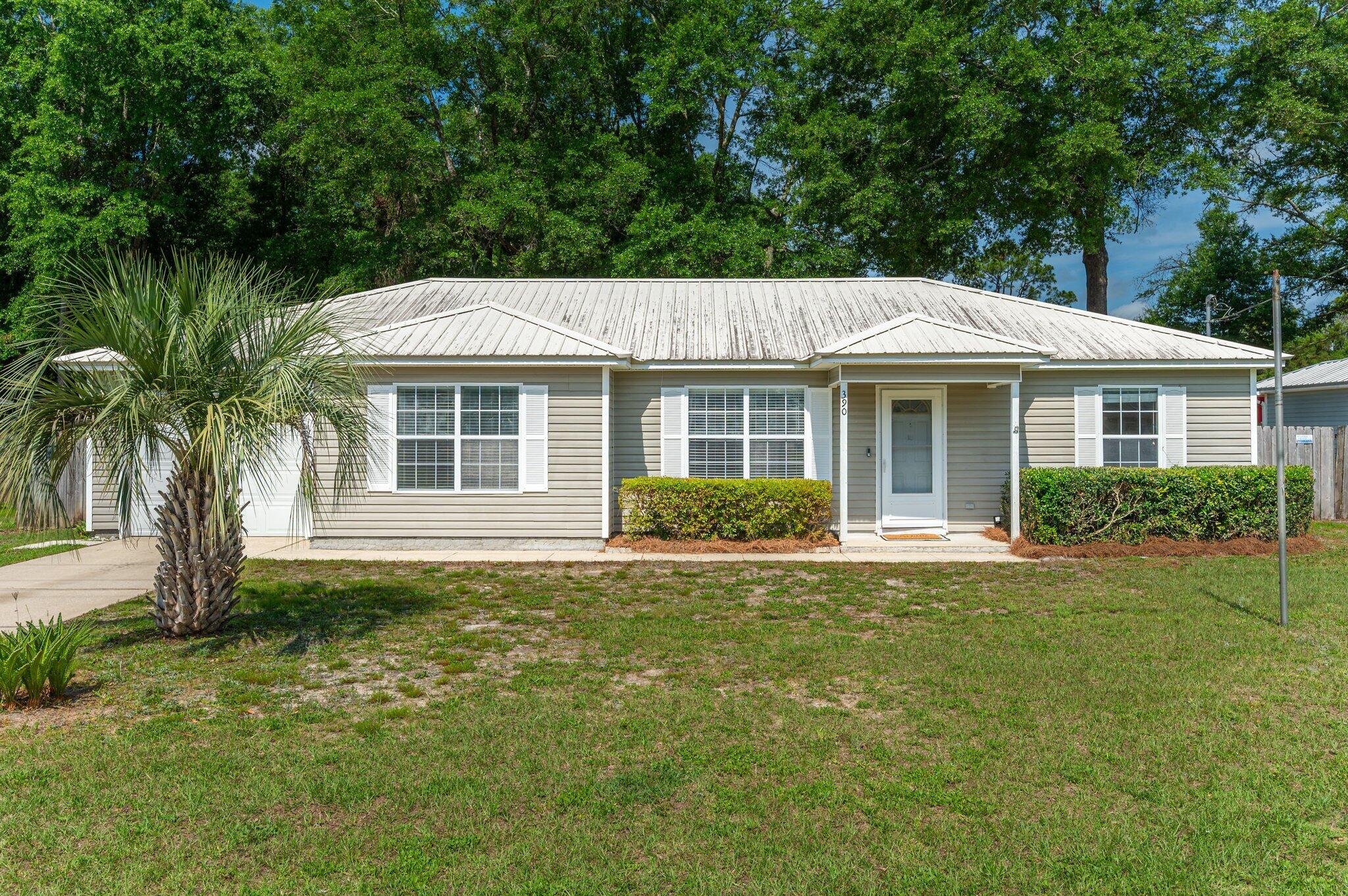 *VA Assumable Loan 4.5%*This adorable property has recently been refreshed & is ready for new owners! Recent updates include NEW carpet, fresh paint throughout, metal roof 2019 & HVAC replaced in 2023. Convenient location offers close proximity to groceries,gyms library, and community park.The enclosed patio is the perfect spot for relaxing and enjoying the large fenced yard, complete with mature shade trees and paver lined patio.Floorplan features a galley kitchen w/built-in work space, ample cabinets, and large double door pantry area. As an added incentive to the new homeowner, washer/dryer & shed conveys, as well. Easy commute to Duke Field, 7SFG, and Eglin AFB-40 minutes to the beautiful white sand beaches of Destin.Whether you're PCSing in or looking to plant roots, check this one o
