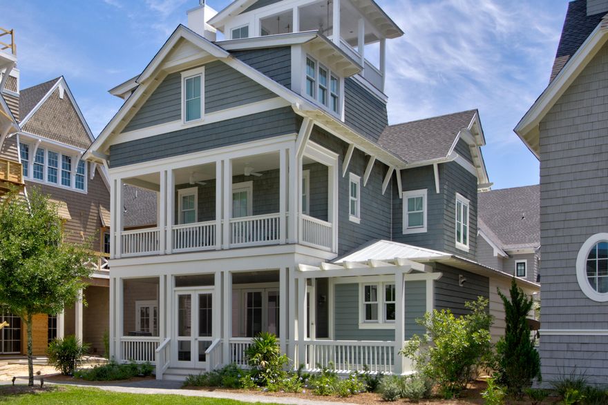 Experience the ultimate in resort living that Grace Point has to offer. Owners can enjoy private gated access within the community into The Watersound Beach Club. Upon approach to the home, you will quickly note its iconic architectural styling that is reminiscent of long established Nantucket massing. Once inside, gaze upon lavishly furnished open spaces that flow seamlessly into each other. A bi-fold accordion style door in the gathering area blurs the line between indoor and outdoor living and opens to a graciously appointed screened in porch and refreshing cocktail pool. The kitchen is a chef's dream, outfitted with wolf and subzero appliances, and dressed in quartz countertops and marble backsplashes. Hand crafted design elements include 200+ year old hand hewn ceiling beams and