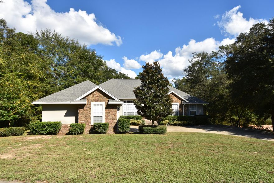 Private Wooded View in South Crestview! Home Warranty included! Open Living with Elevated Ceilings and Crown Molding. Hardwood Floors in the Foyer and Formal Dining Room, Ceramic Tile in Wet Areas, and Carpet in the Living Room and Bedrooms. Beautiful Kitchen with Granite Counters, Custom Cabinets with rope trim, ALL appliances including a GAS Range, Pantry, Center Island, and Breakfast Nook. Kitchen overlooks the Living Room with a Tile surround Gas Fireplace. Step out onto the HUGE Screened Porch with a wooded view and enjoy the outdoors! Secluded Master Suite with a Sitting Area and an 11 x 9 Walk-in-closet. Master Bath has a double vanity, jetted tub, and separate shower. 3 Additional Bedrooms share the 2nd Full Bathroom with a double vanity. Plus, a Powder Room for your guests!