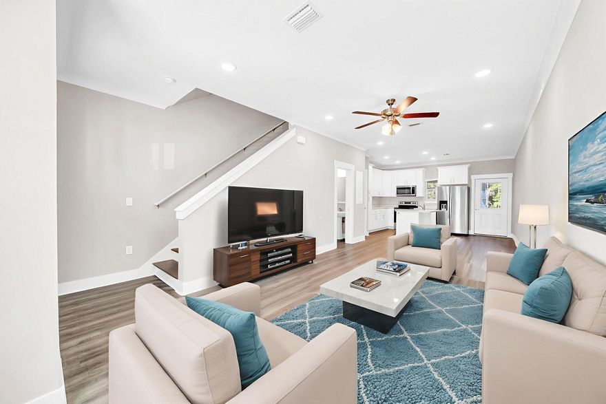 Priced competitively with a low HOA, this move-in ready townhome offers exceptional value and flexibility--ideal as a primary residence, second home, or income-producing investment. Located within a very well-maintained community, residents enjoy desirable amenities including a pool, pickleball and basketball courts, and a playground.Ideally positioned near Freeport schools and Publix, daily routines and errands are effortless. The home offers quality, affordable living with peaceful wooded back views that provide a rare sense of privacy. Designed for easy coastal living, it also offers convenient access to South Walton's iconic 30A beaches.Also, listed for rent: https://beachsunsets.appfolio.com/listings/detail/fa757e0c-2c4e-4e1d-ad30-6812043e9234 Inside, the open-concept layout creates a seamless flow between the kitchen, dining, and living areasperfect for entertaining or relaxing. The kitchen features quartz countertops, stainless steel appliances, and a spacious breakfast bar. A powder room and large back porch complete the main level.

Upstairs, you'll find three bedrooms and two full baths, including a generous primary suite designed for comfort and retreat.