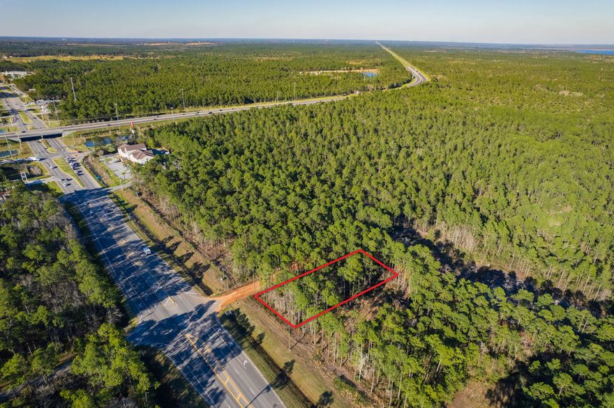 SELLING BOTH PARCELS TOGETHER: 40-1N-28-0090-22400-0010 & 40-1N-28-0090-22400-0240. This unique commercial property consists of two adjoining parcels, creating a larger combined lot with 100 feet of road frontage on a high-visibility corner on Avalon Blvd. With a dedicated turn lane already in place for easy access and close proximity to the I-10 exit, this location offers excellent potential for a variety of business opportunities. Utilities are available at these lots. Zoned commercial and situated in a rural area that is seeing continuous growth and development, this lot provides a great opportunity to establish a business in an emerging market. Don't miss the chance to invest in this expanding area!