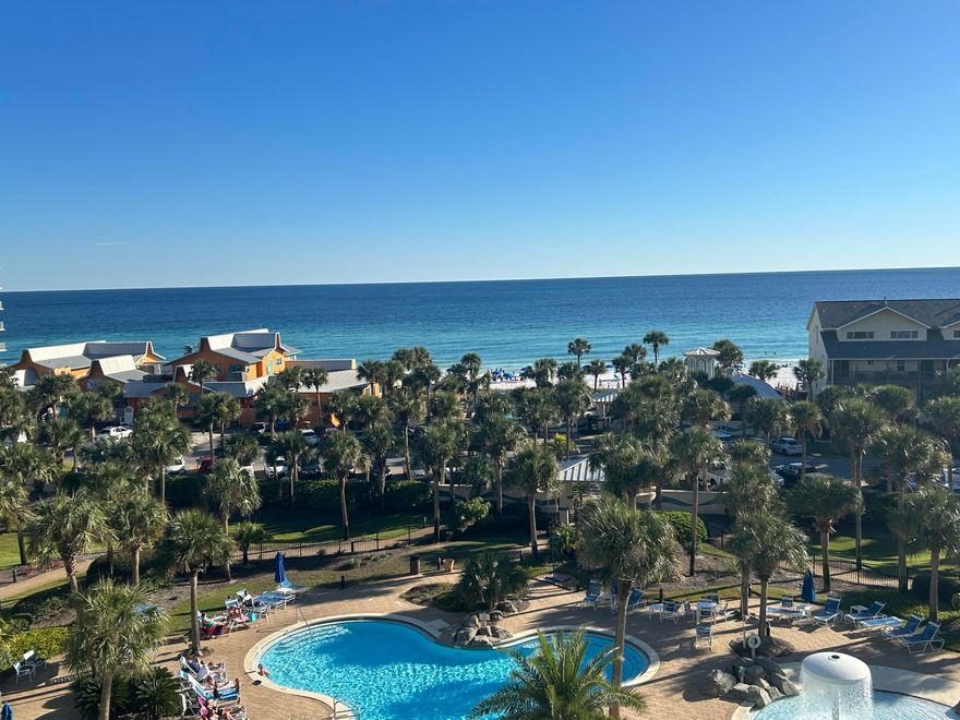 HUGE price improvement!  Larger of the two-bedroom plans with 340-368 more sq.ft and same HOA dues. Seller to pay special assessment of $12,500. Unobstructed gulf view from main bedroom and family room is a WOW! Enjoy the large balcony stretching the full length of the condominium with access from the bedroom and family room.   Kitchen features granite counter tops and stainless appliances.  Washer and dryer were replaced in 2024, freshly painted. Lovingly maintained. Sterling Shores has two fabulous pools--one is gulf front and heated seasonally with private access to the 200' of deeded gulf front. The lagoon pool has a mushroom fountain and zero entry feature. Sterling Shores is a gated community with full time security & maintenance.  Storage locker is climate controlled.
