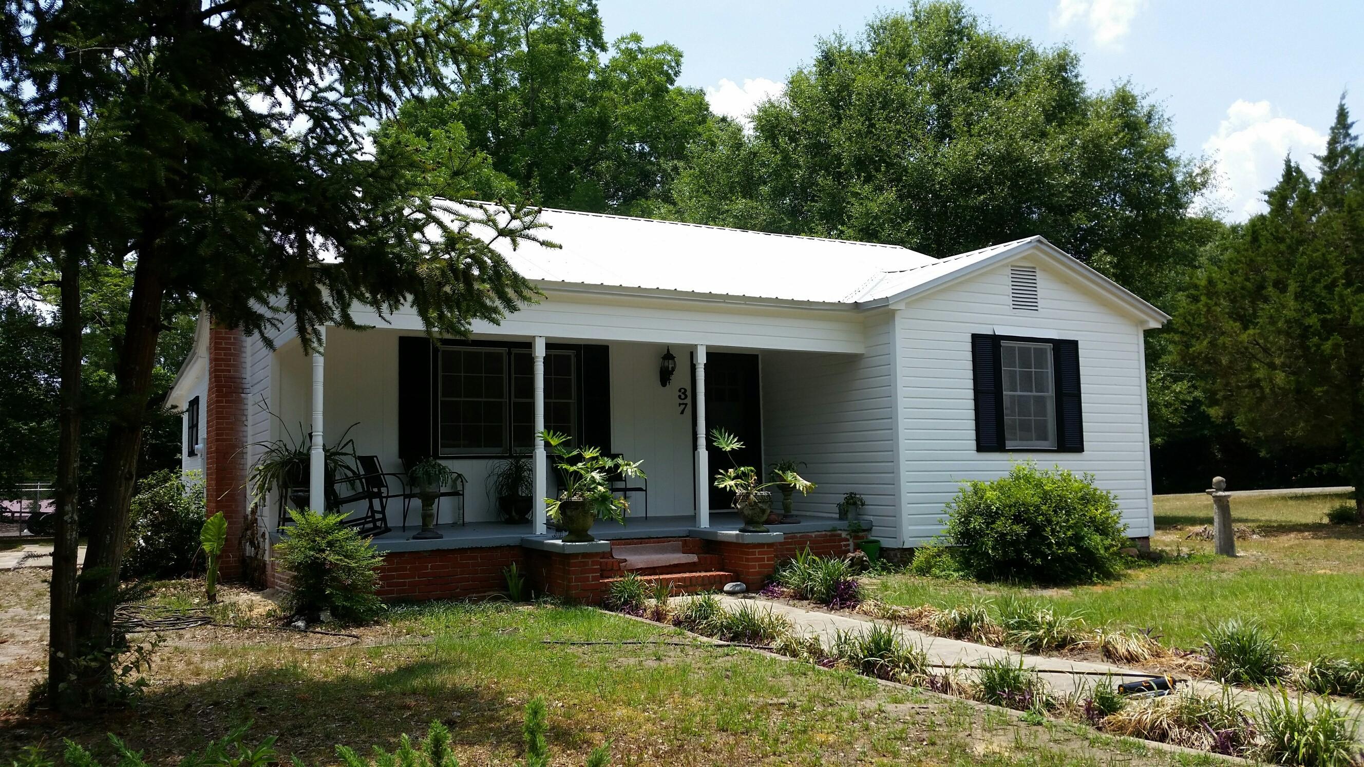 This charming home has totally been renovated by Paul Rushing Construction Company. Seller has had new flooring, top of the line appliances installed, all new plumbing, new, freshly painted inside and out, new roof and hot water heater replace 4 years ago, added 2nd bath (all new), and remodeled original bathroom. Made a closet in downstairs 3rd bedroom and added a new inside laundry room. Home has been treated and under termite bond. Cottage style home is located in the Historic District of DeFuniak Springs and a quick stroll from the DeFuniak Lake yard. Seller will finance.