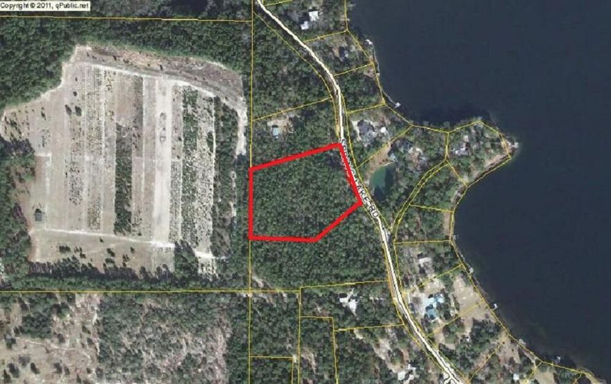 Private, peaceful and full of hardwood trees. 4 acres in a subdivision with a lake! Common area includes boat launch, gazebo, restrooms and is gated and private for homeowners only. Lake is perfect for fishing or kayak.