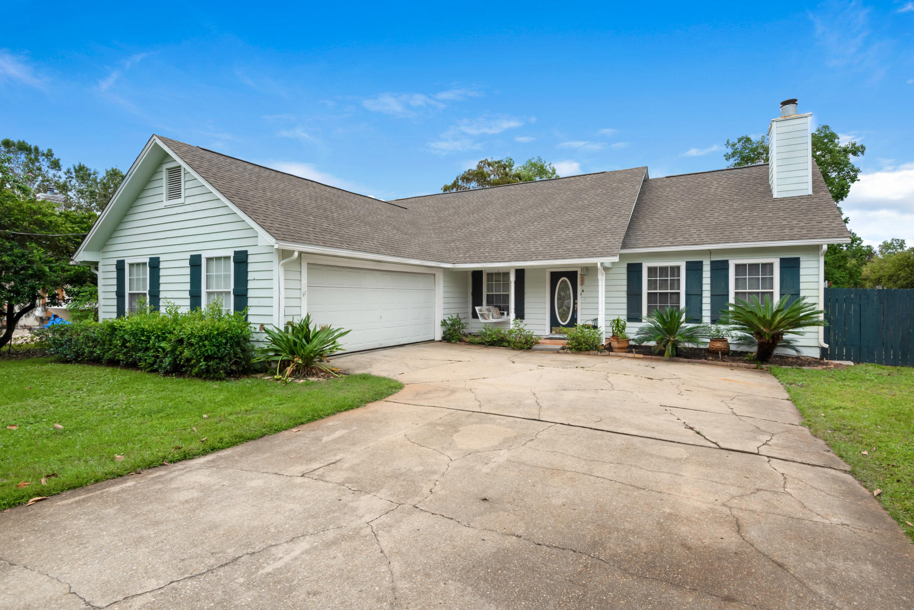 Located in 'old Destin', This beautiful beach cottage is just a block away from Joe's Bayou public boat dock. Destin elementary, and the Destin Harbor are less then 5 minutes. This quaint, Florida beach cottage sits on the largest lot in Bayview Manor with an expansive fenced back yard and huge patio. Timeless tile boasts throughout the house with a gorgeous tile fireplace in the living room. Fresh new paint throughout. Come see this Destin DREAM home for yourself!